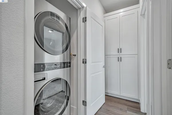 a bathroom with double sink and a mirror
