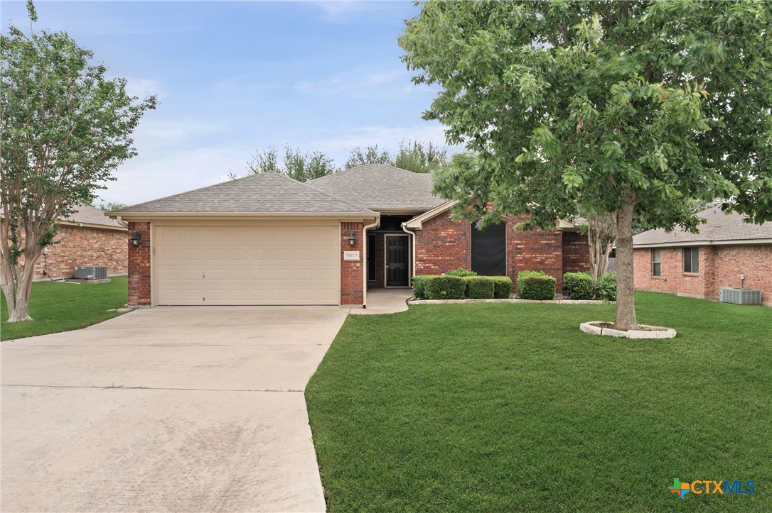 5015 Karla Way Temple, TX 76502 - Photo 1 of 1 a front view of a house with garden