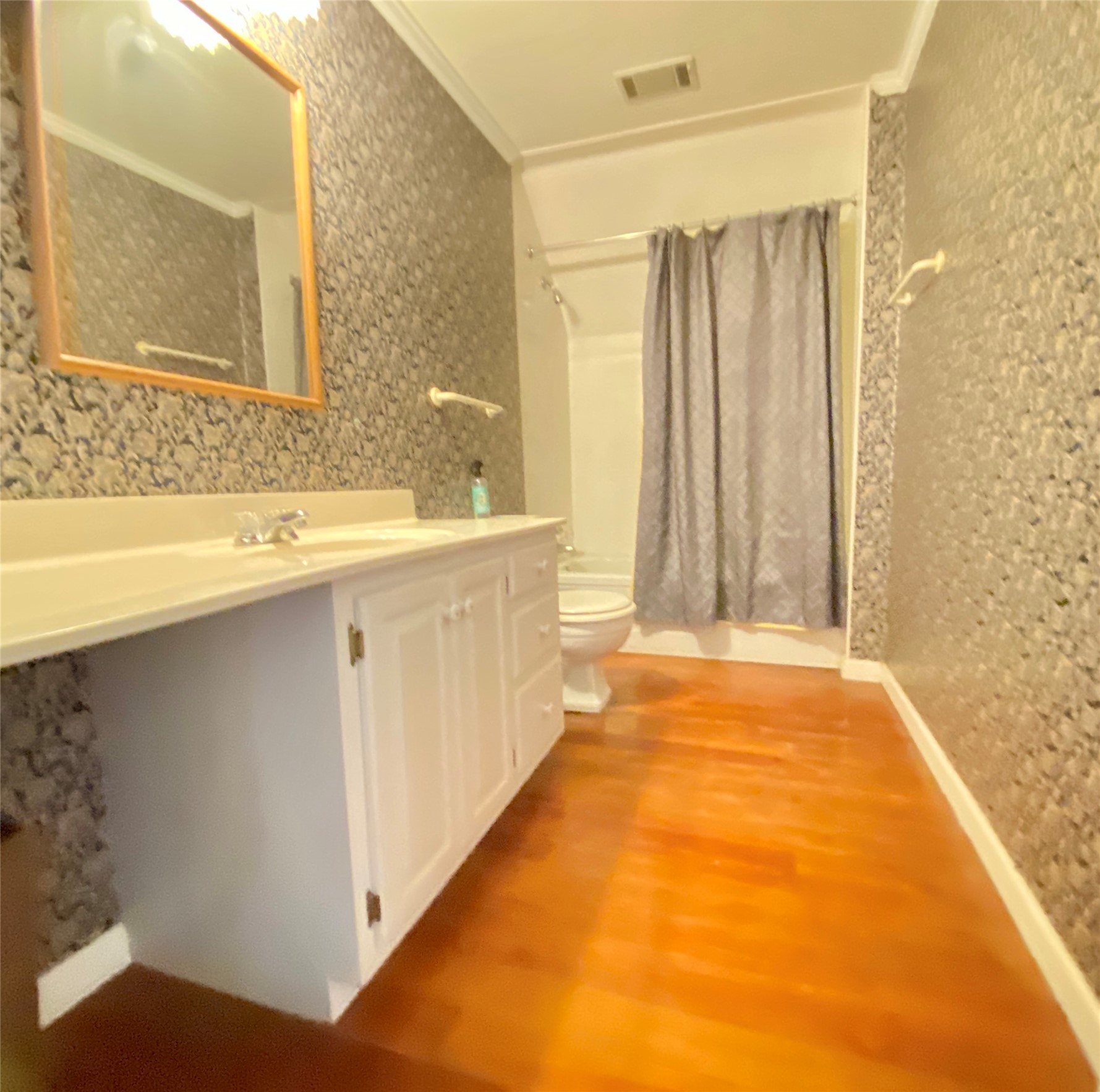 223 East Robert Toombs Avenue Washington, GA 30673 - Photo 33 of 46 a bathroom with a sink and a bathtub