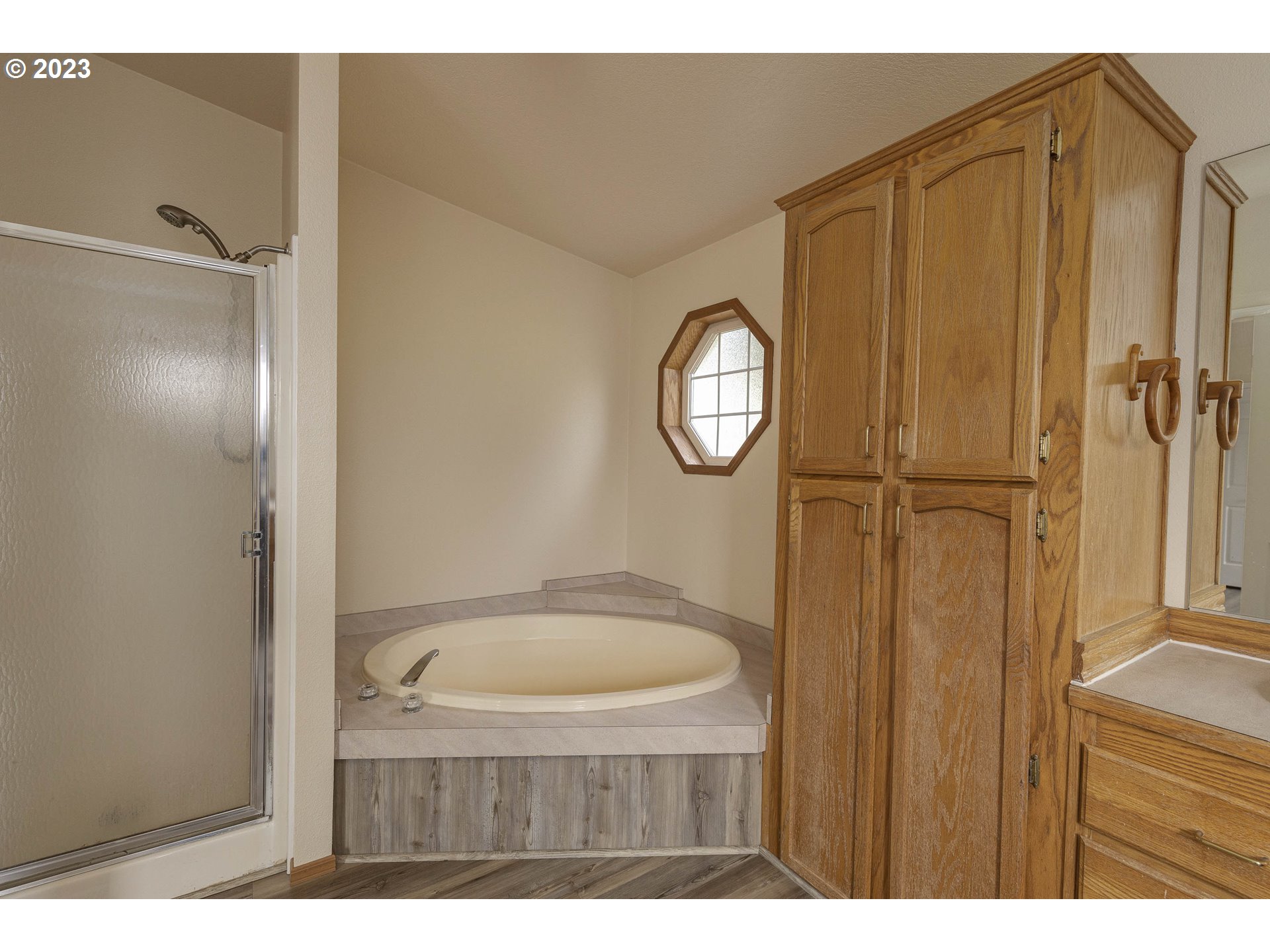 23246 Gooseneck Road Sheridan, OR 97378 - Photo 14 of 27 a bathroom with a shower a mirror and a sink