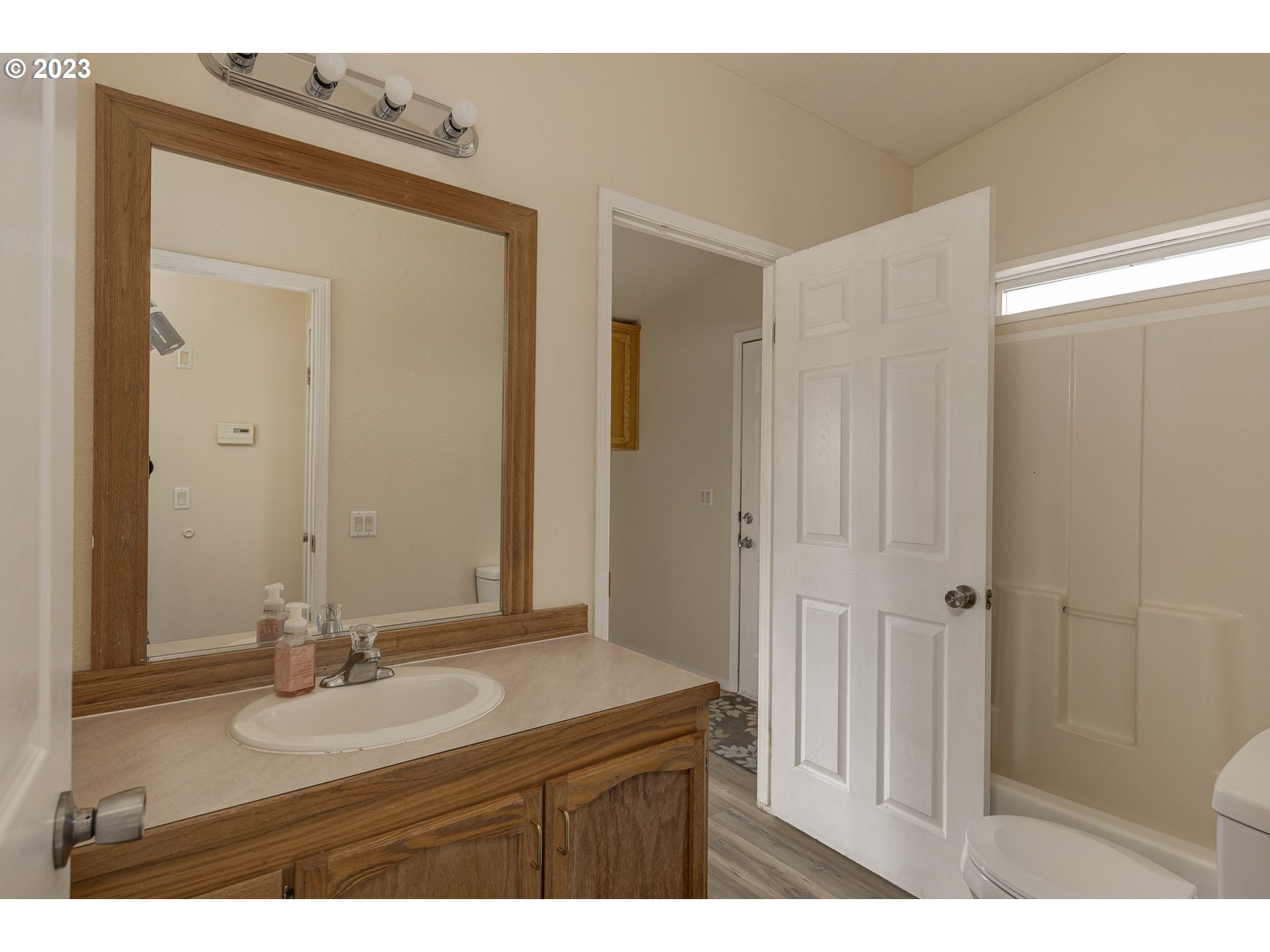23246 Gooseneck Road Sheridan, OR 97378 - Photo 15 of 27 a bathroom with a sink vanity granite tub and shower