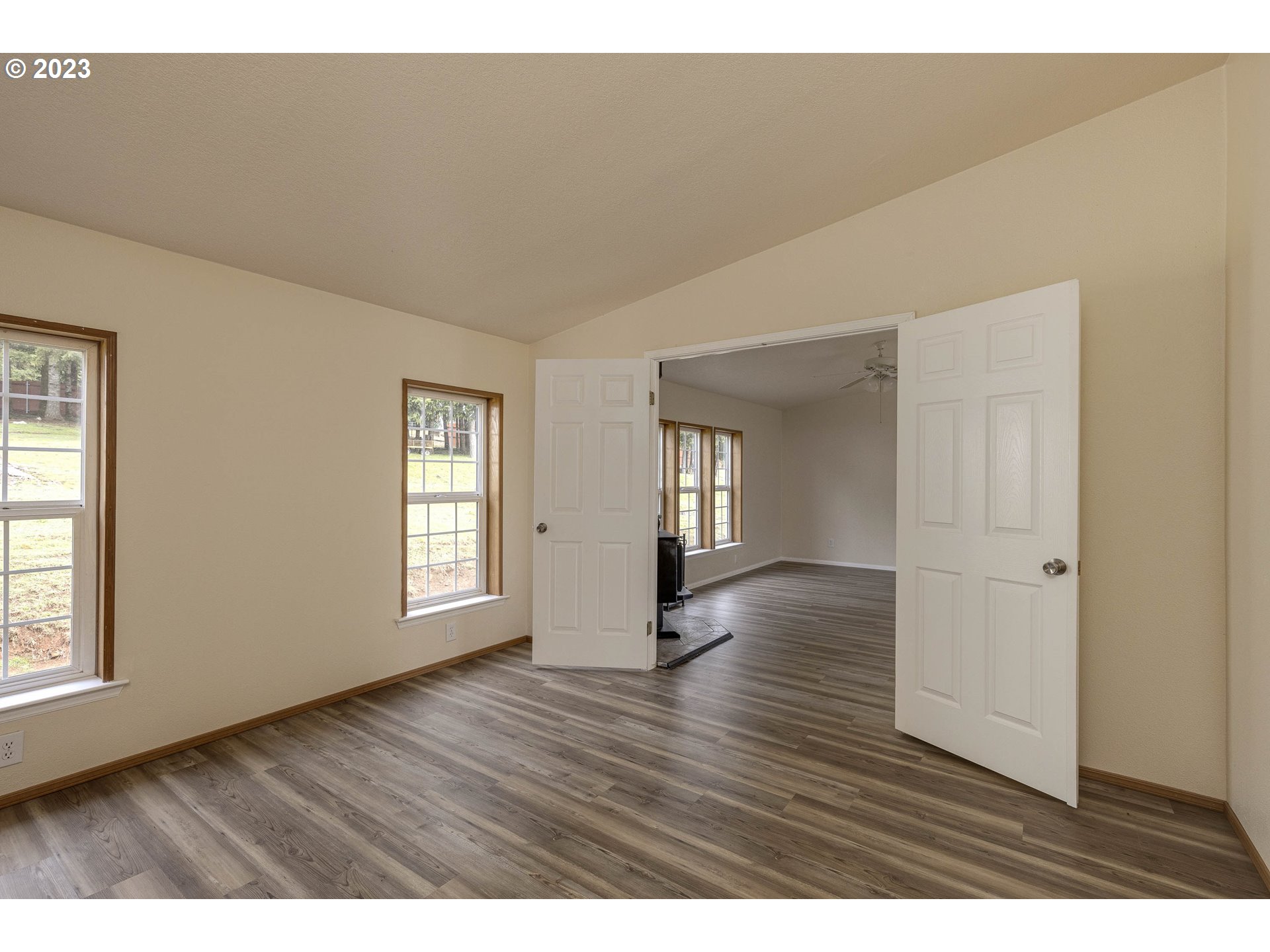 23246 Gooseneck Road Sheridan, OR 97378 - Photo 16 of 27 a view interior of a house with wooden floor and windows