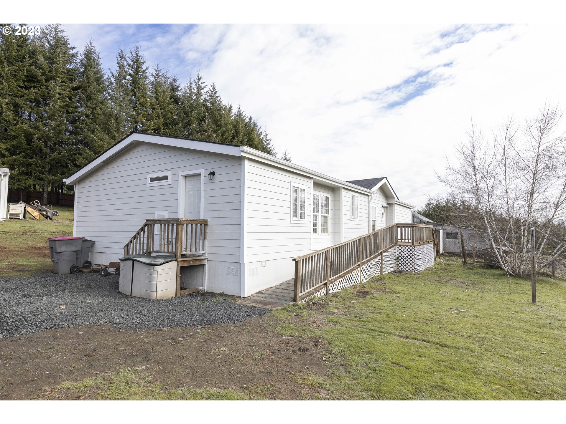 23246 Gooseneck Road Sheridan, OR 97378 - Photo 2 of 27 a view of a house with a yard and sitting area