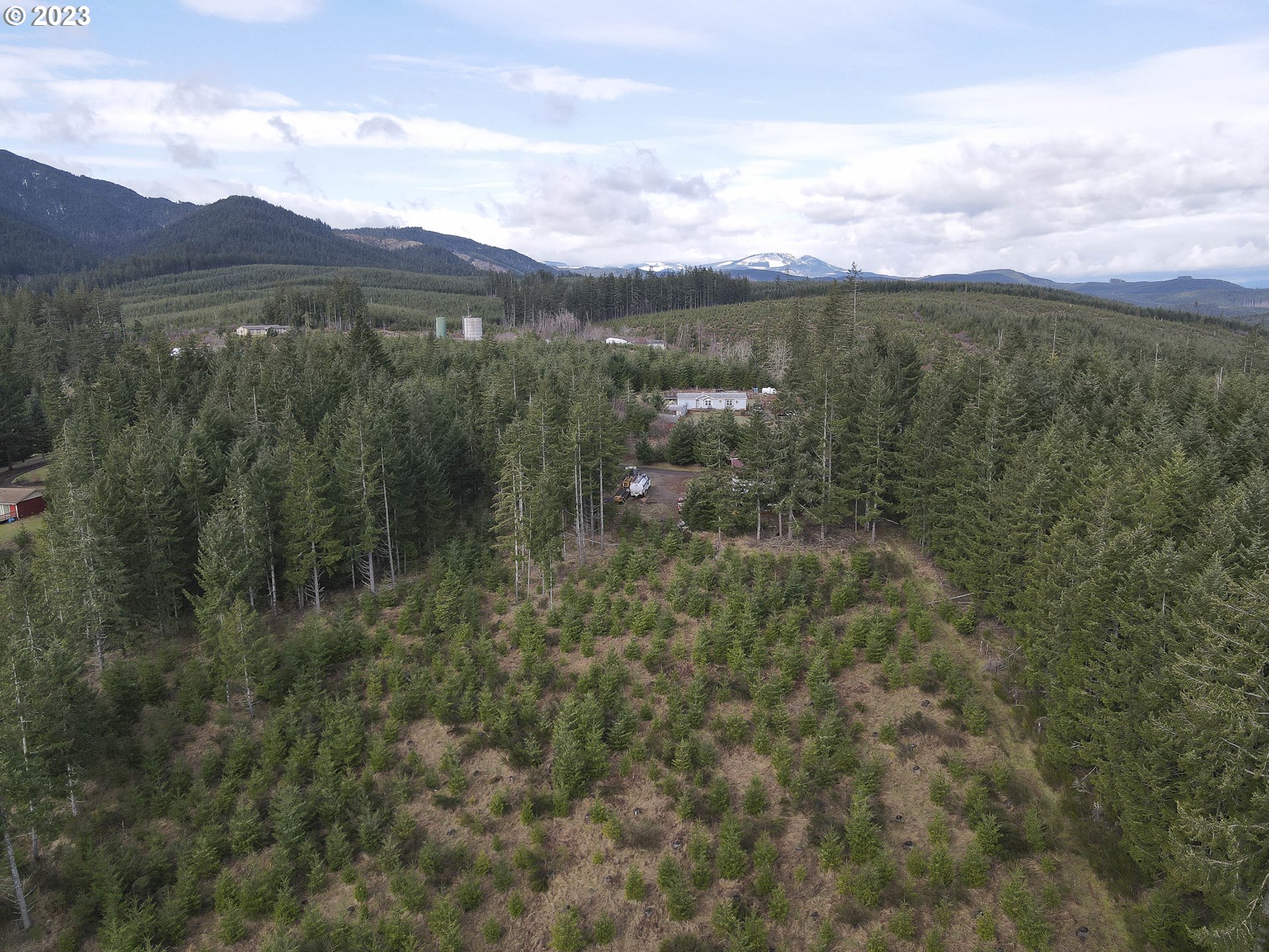 23246 Gooseneck Road Sheridan, OR 97378 - Photo 21 of 27 a view of a lake with a mountain in the background