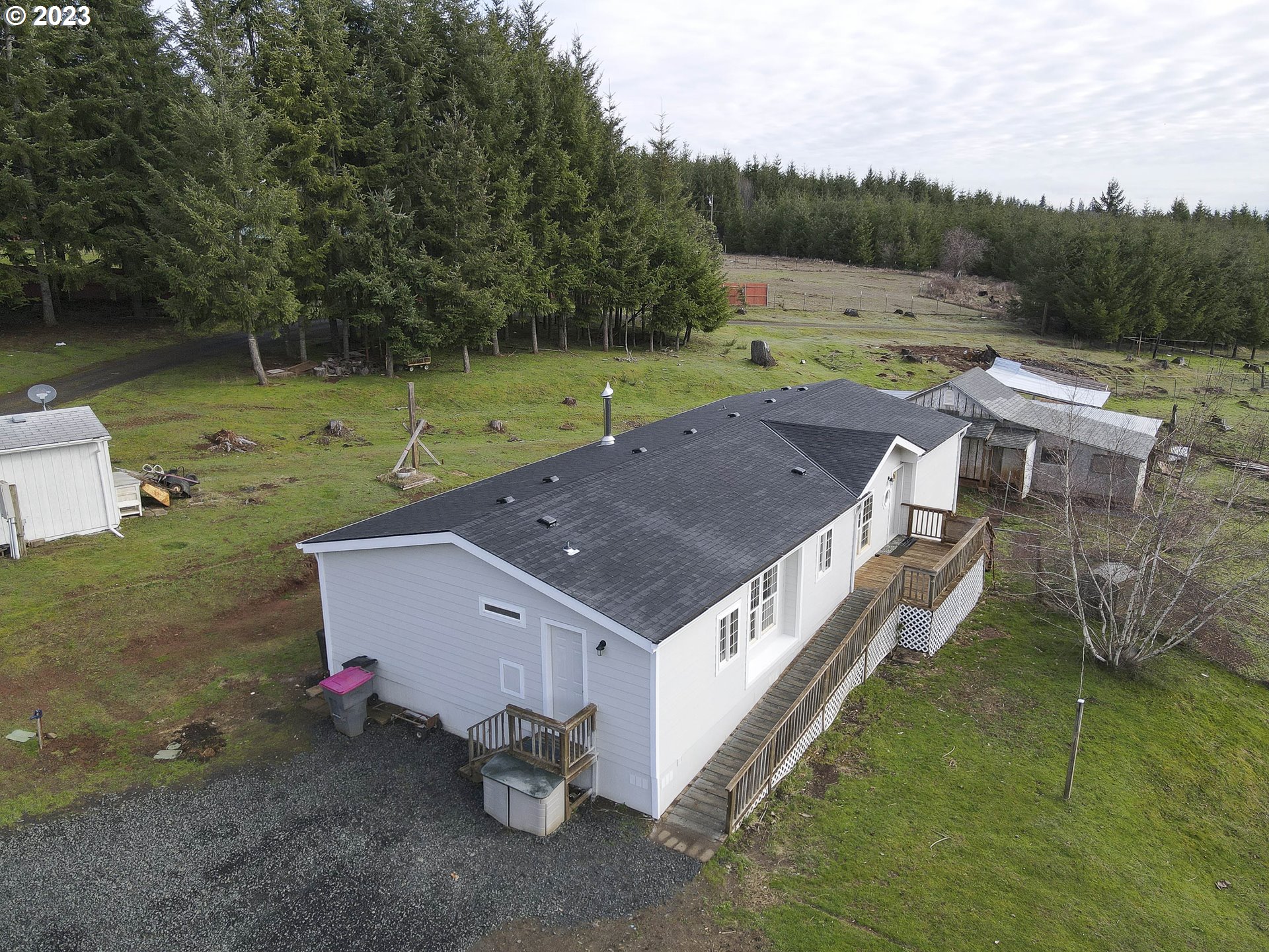 23246 Gooseneck Road Sheridan, OR 97378 - Photo 23 of 27 an aerial view of a house with a yard basket ball court and outdoor seating
