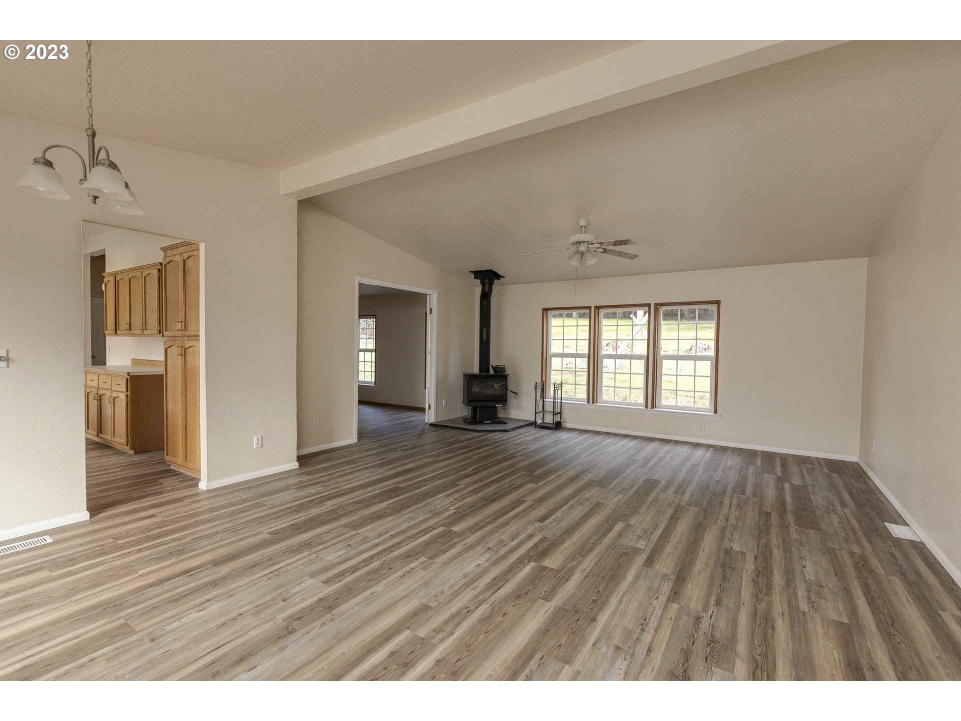 23246 Gooseneck Road Sheridan, OR 97378 - Photo 5 of 27 wooden floor in an empty room with a window