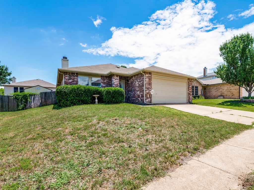 5309 Kingslink Circle Fort Worth, TX 76135 - Photo 1 of 1 a front view of a house with a yard and garage