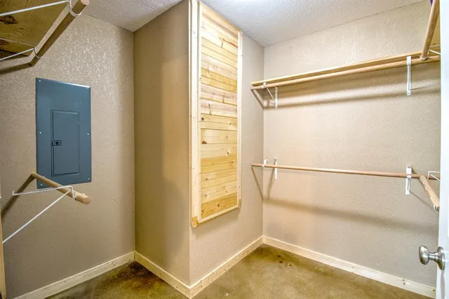 a view of a room with racks on the wall