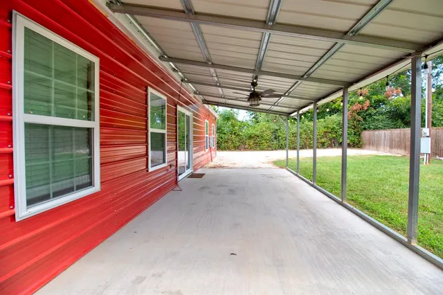 a view of porch with a backyard