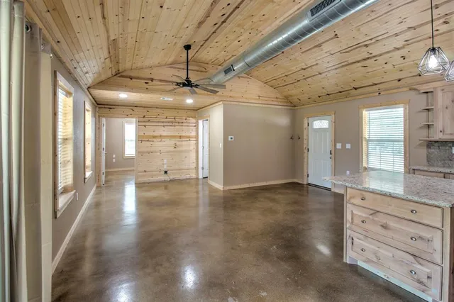 a view of an empty room and window