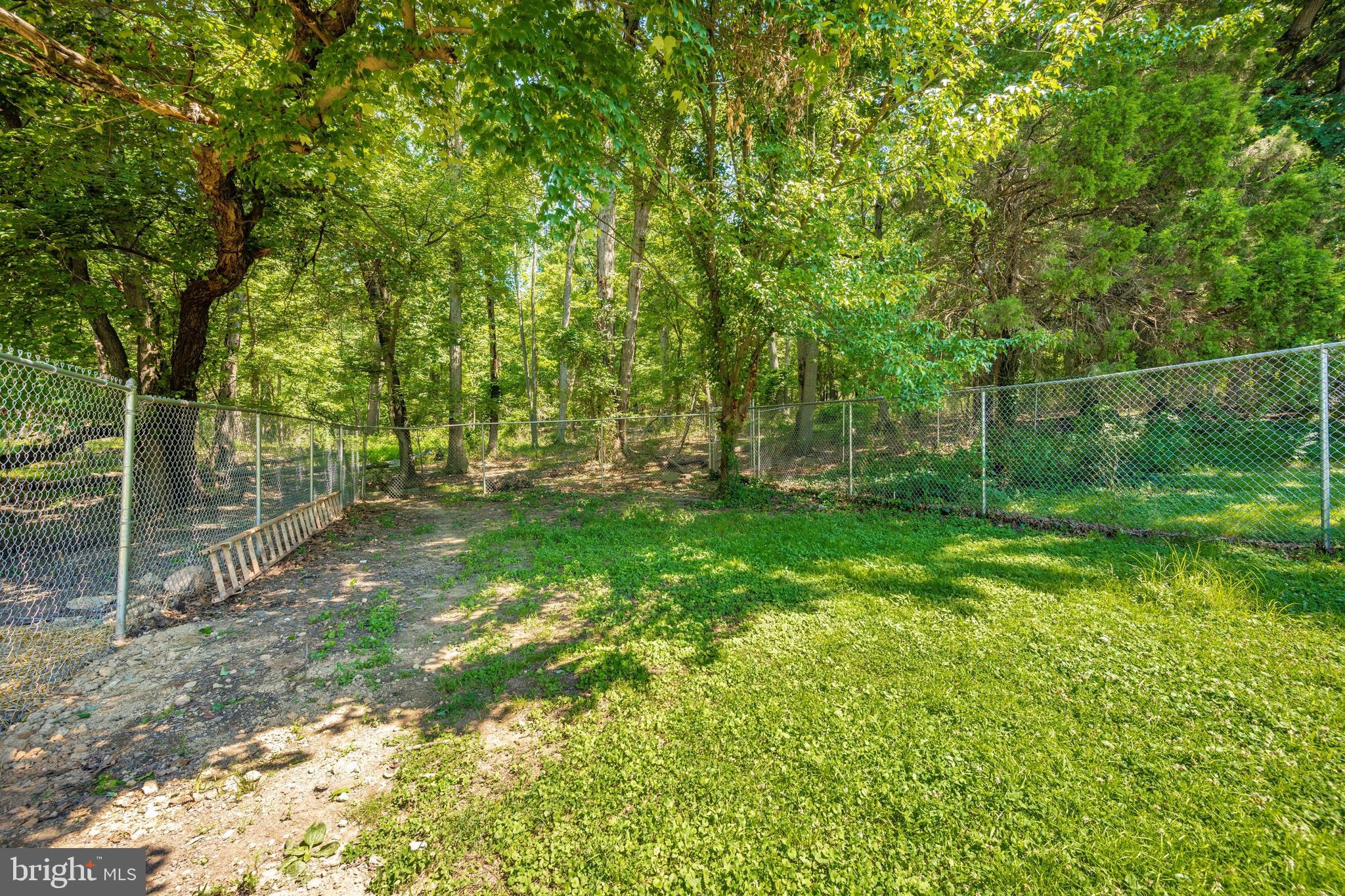 4304 Ridge Avenue Baltimore, MD 21227 - Photo 44 of 50 a view of a field with a tree