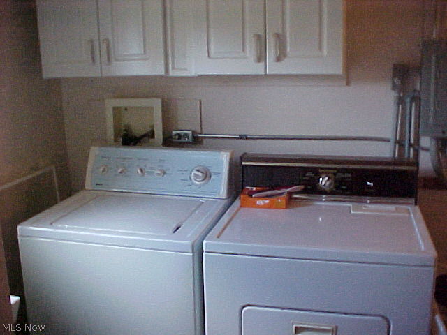 9060 West Ridge Road Elyria, OH 44035 - Photo 13 of 20 Washer and dryer stay as well. Cabinets above the appliances for soaps and laundry items.