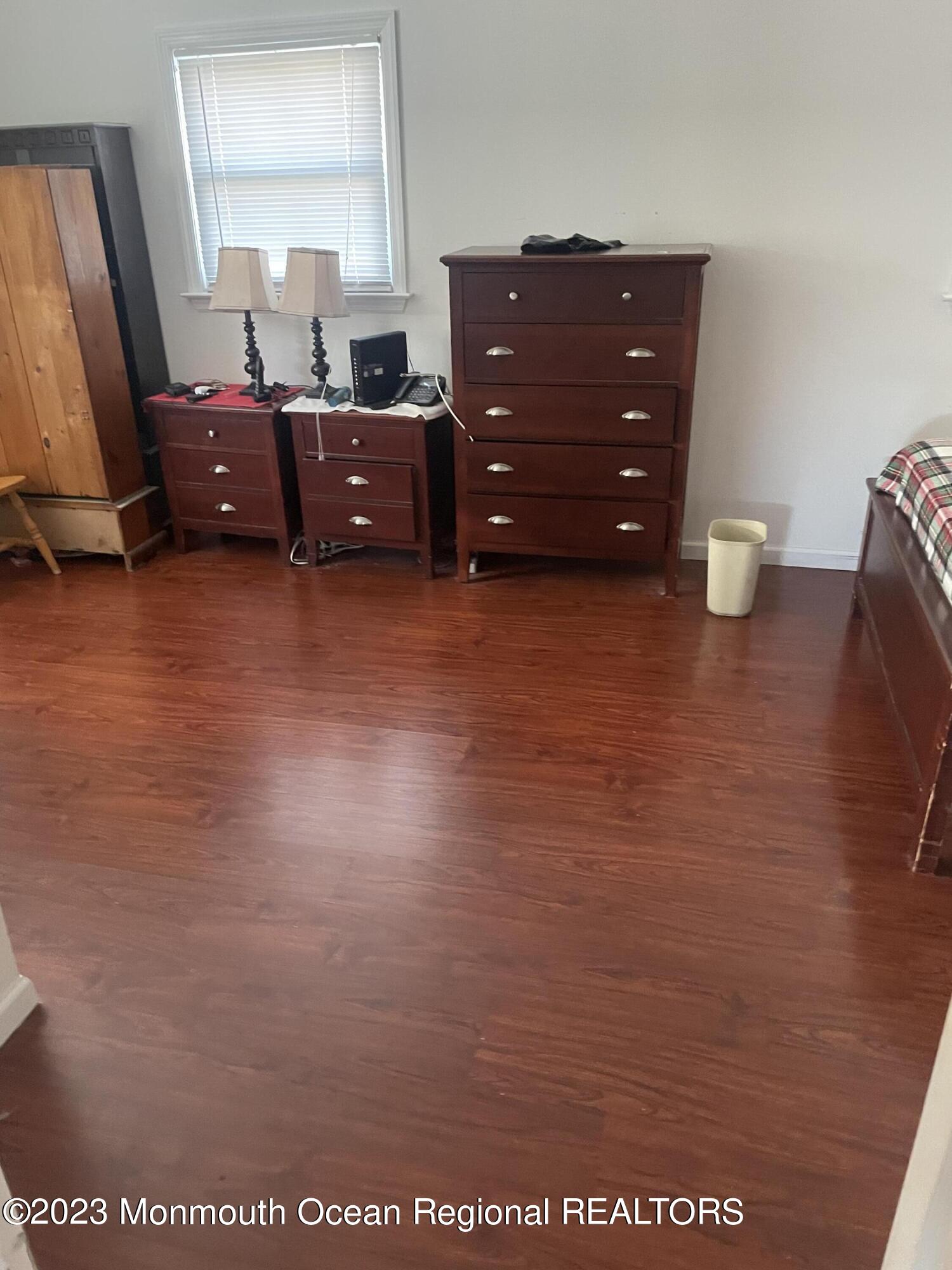 22 Pilot Road Toms River, NJ 08753 - Photo 5 of 14 a room with a dresser and a window
