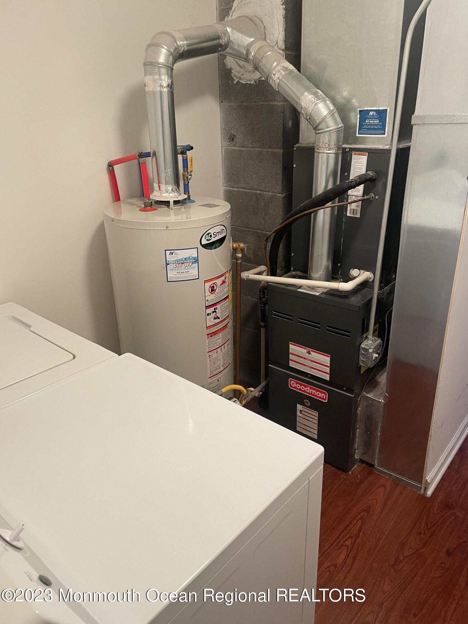 22 Pilot Road Toms River, NJ 08753 - Photo 7 of 14 a utility room with dryer and washer