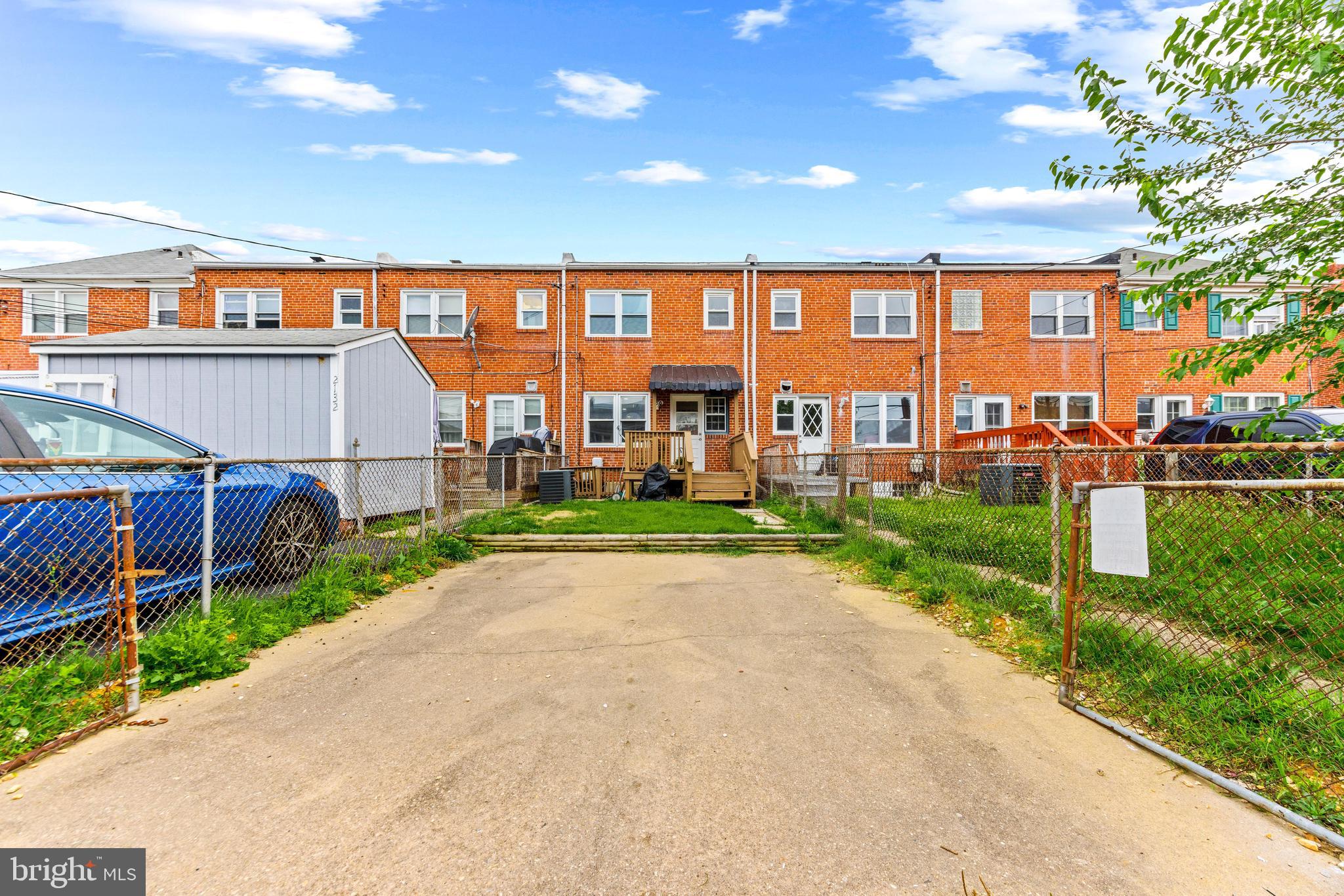 2134 Firethorn Road Middle River, MD 21220 - Photo 32 of 41 a view of a big room with a big yard and potted plants