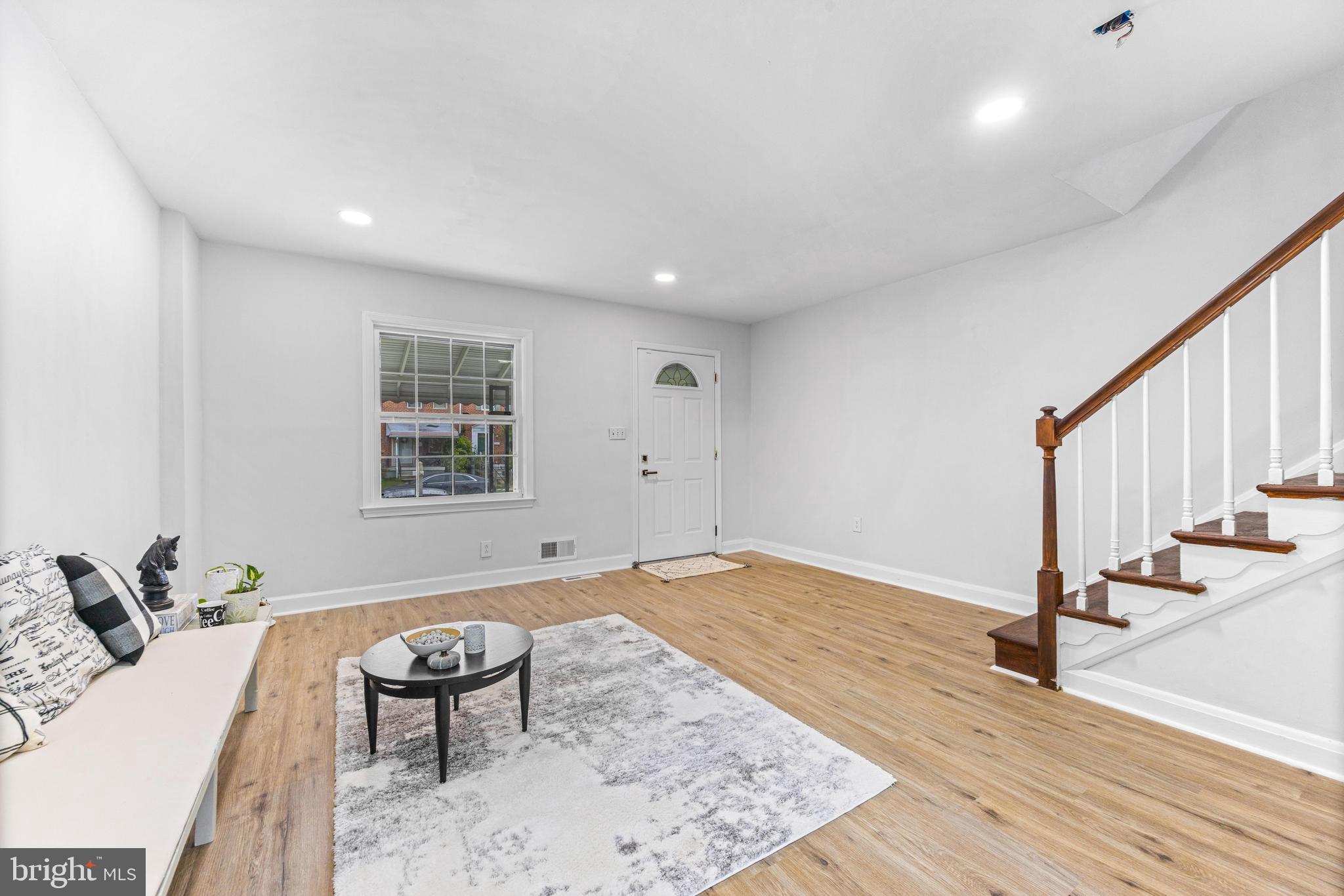 2134 Firethorn Road Middle River, MD 21220 - Photo 4 of 41 a view of a livingroom with furniture and stairs