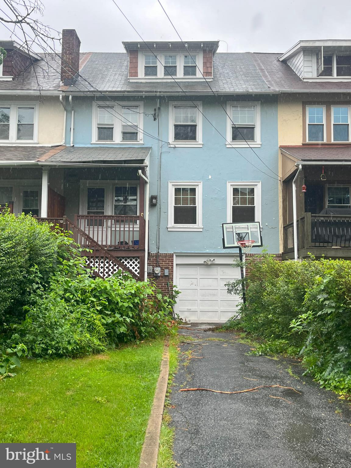 1322 Garfield Avenue Wyomissing, PA 19610 - Photo 2 of 2 a front view of a house with garden