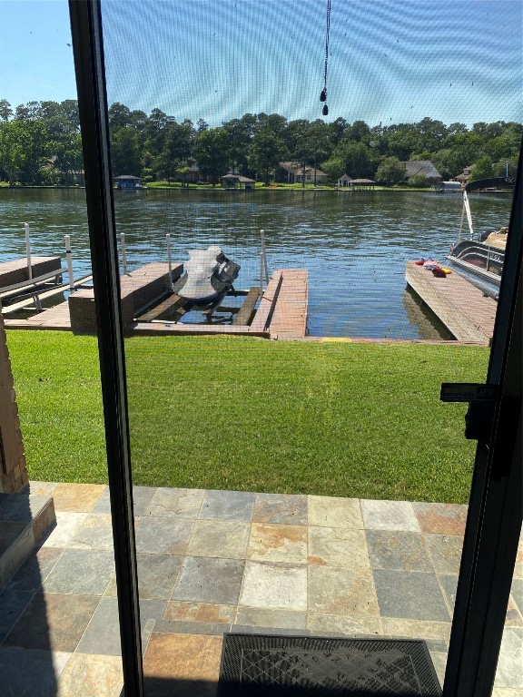 801 River Road, Unit 123F Montgomery, TX 77356 - Photo 20 of 32 a view of a lake with a big yard