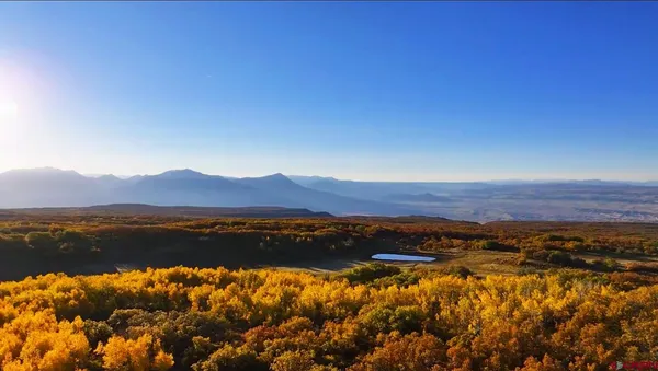 a view of lake and mountain
