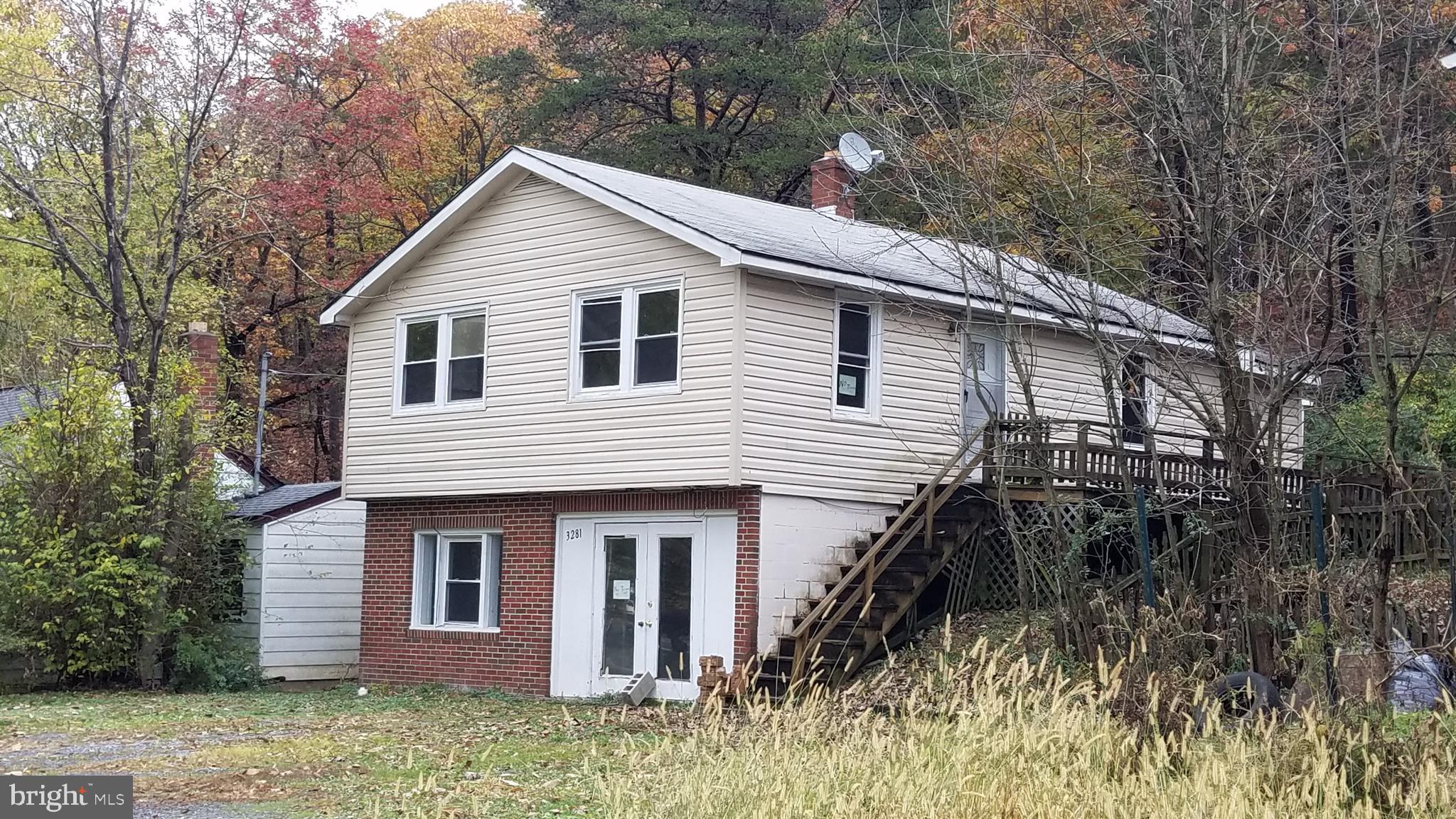 3281 Valley Road Berkeley Springs, WV 25411 - Photo 1 of 26 Side view of home