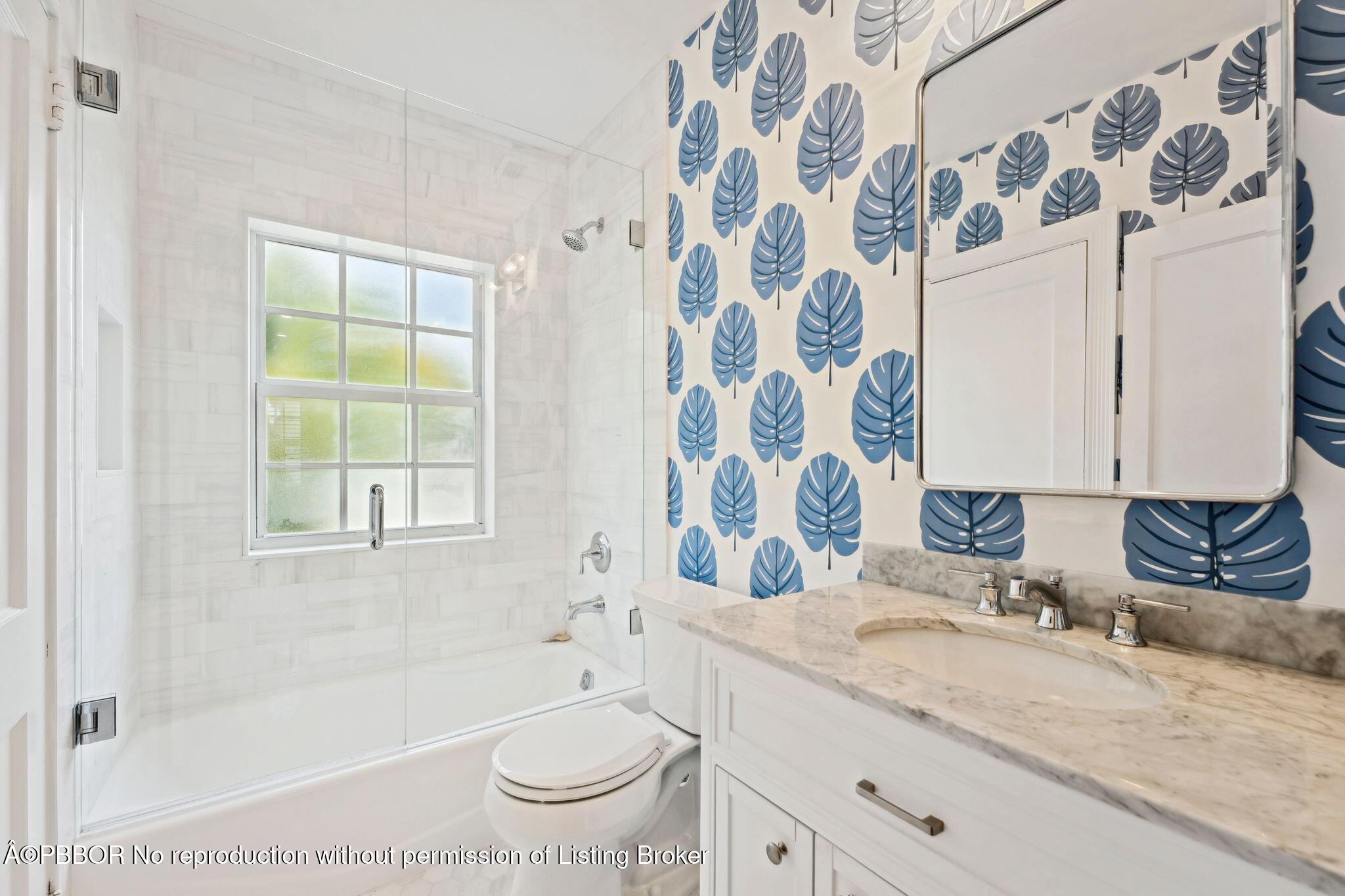 151 South County Road, Unit 2 Palm Beach, FL 33480 - Photo 14 of 22 a bathroom with a granite countertop sink and a mirror
