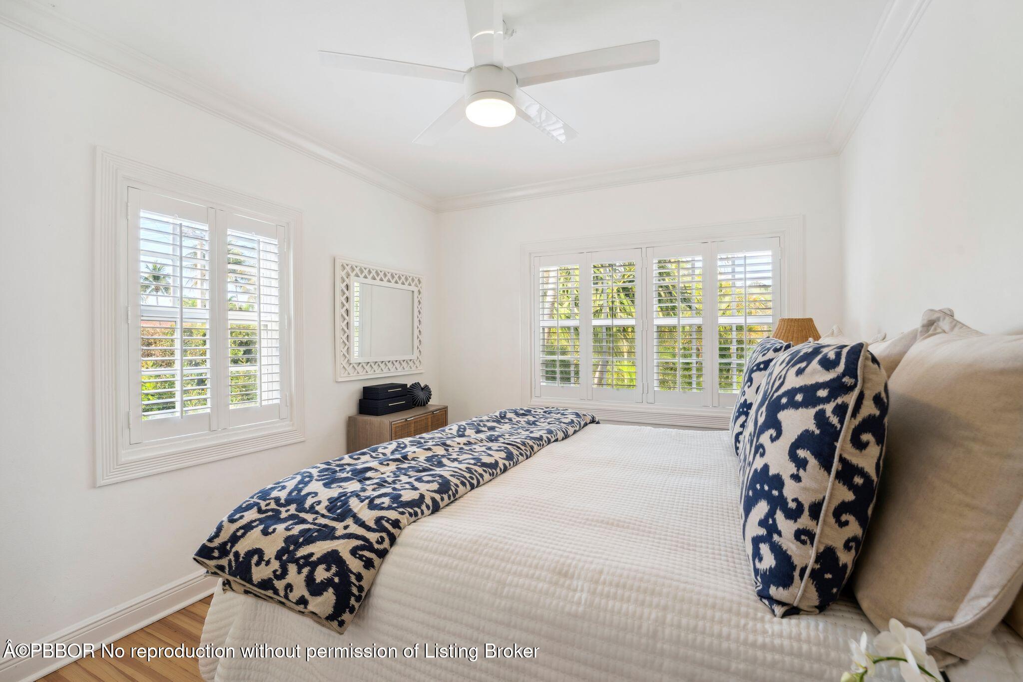 151 South County Road, Unit 2 Palm Beach, FL 33480 - Photo 16 of 22 a bedroom with a bed and a chair