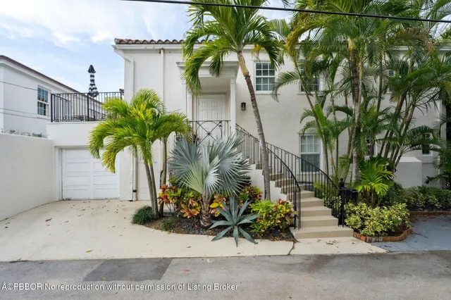 front view of a house with a street