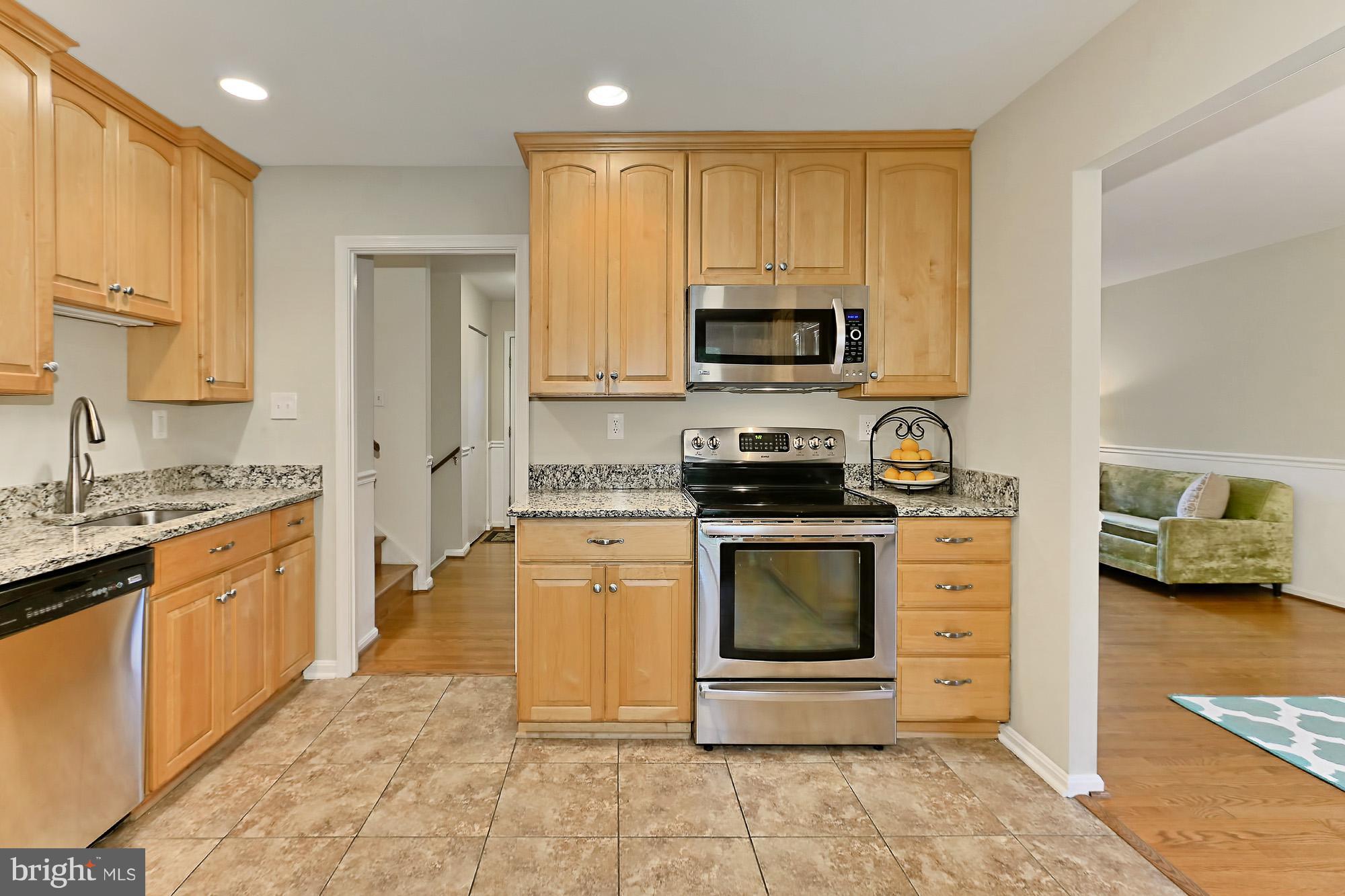 2311 Archdale Road Reston, VA 20191 - Photo 11 of 30 KITCHEN OPENS TO DINING RM & LIVING AREA