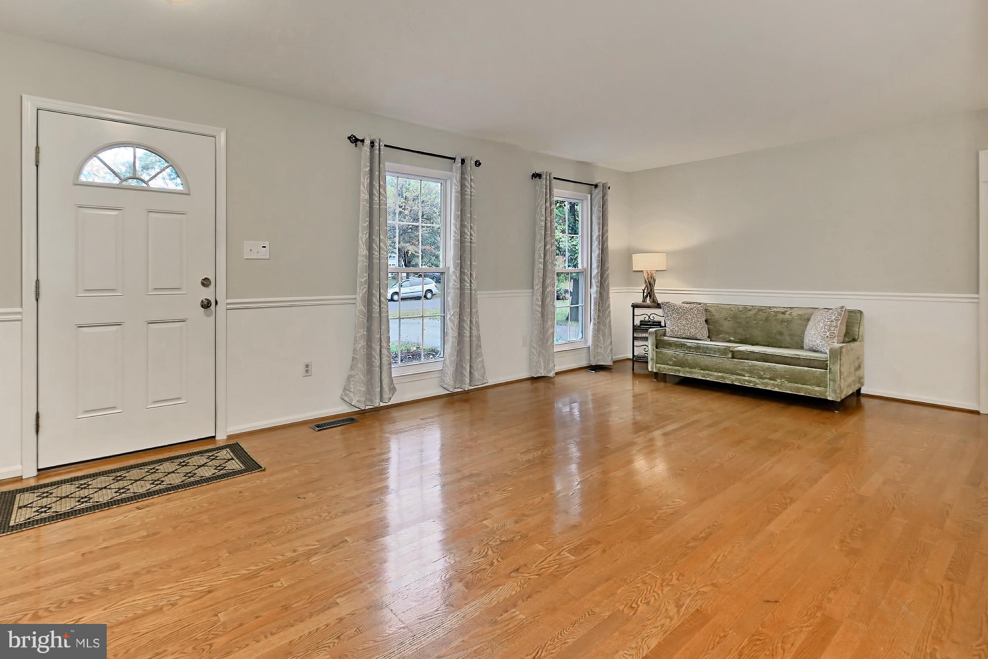 2311 Archdale Road Reston, VA 20191 - Photo 3 of 30 LIGHT-FILLED ENTRY & LIVING SPACE