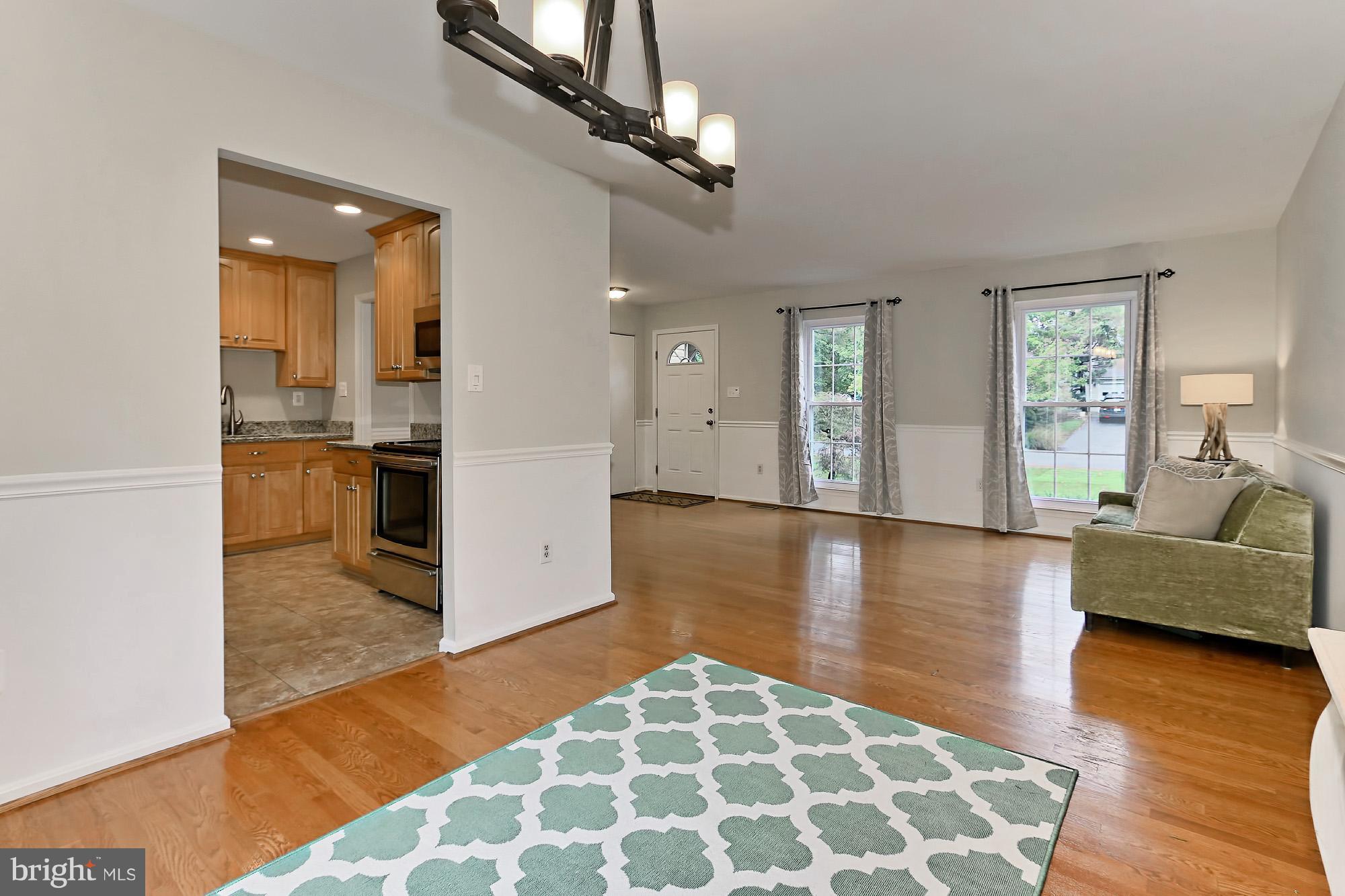 2311 Archdale Road Reston, VA 20191 - Photo 6 of 30 DINING ROOM OPENS TO LIVING AREA & KITCHEN
