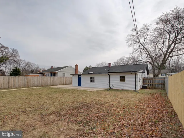 a house with a bench in front of it