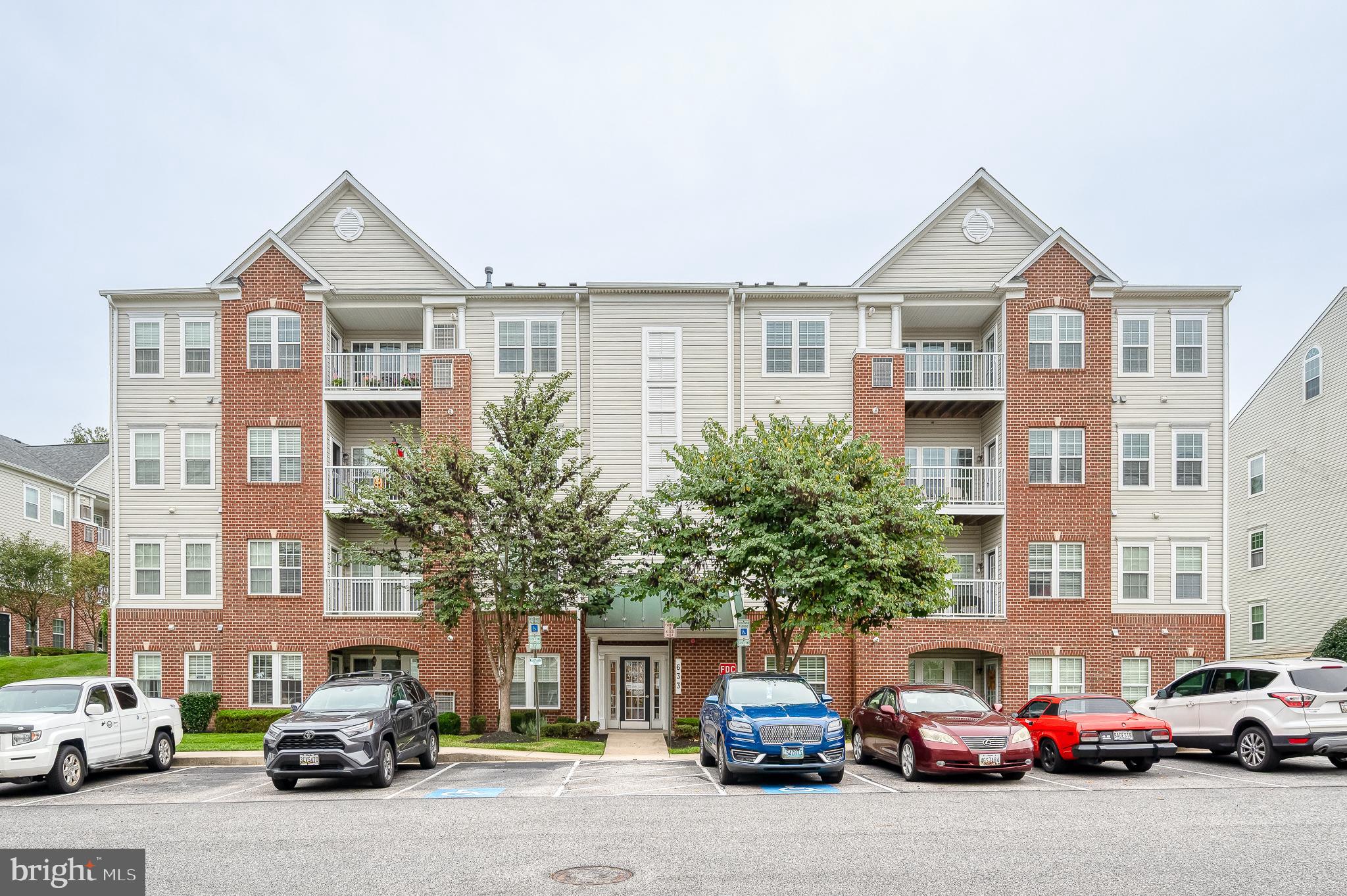 633 Wallingford Road, Unit 404 Bel Air, MD 21014 - Photo 1 of 52 a car parked in front of a building
