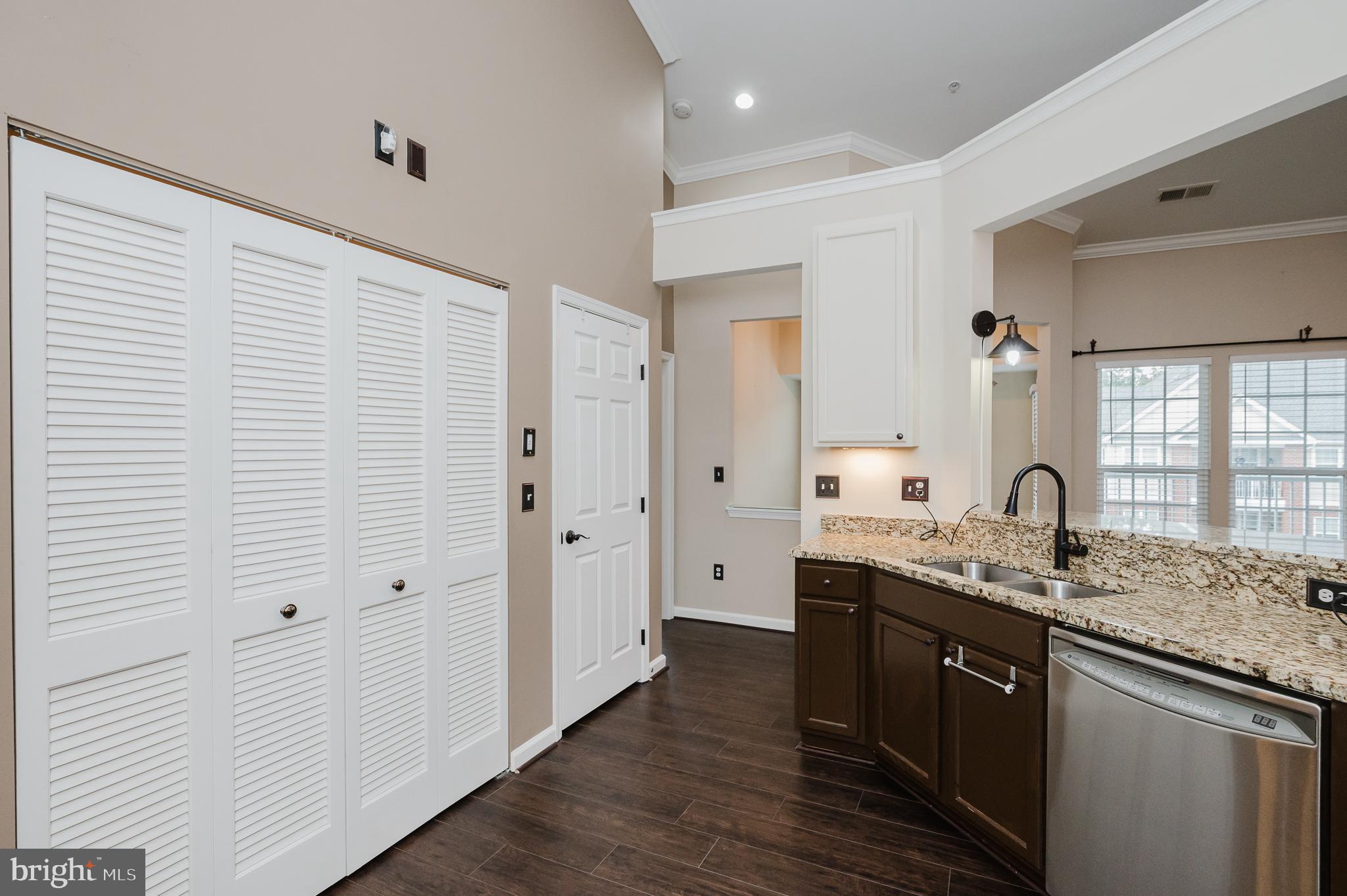 633 Wallingford Road, Unit 404 Bel Air, MD 21014 - Photo 19 of 52 a spacious bathroom with a granite countertop sink a mirror and shower