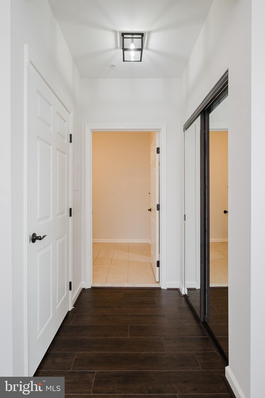 633 Wallingford Road, Unit 404 Bel Air, MD 21014 - Photo 22 of 52 a view of an empty room with wooden floor
