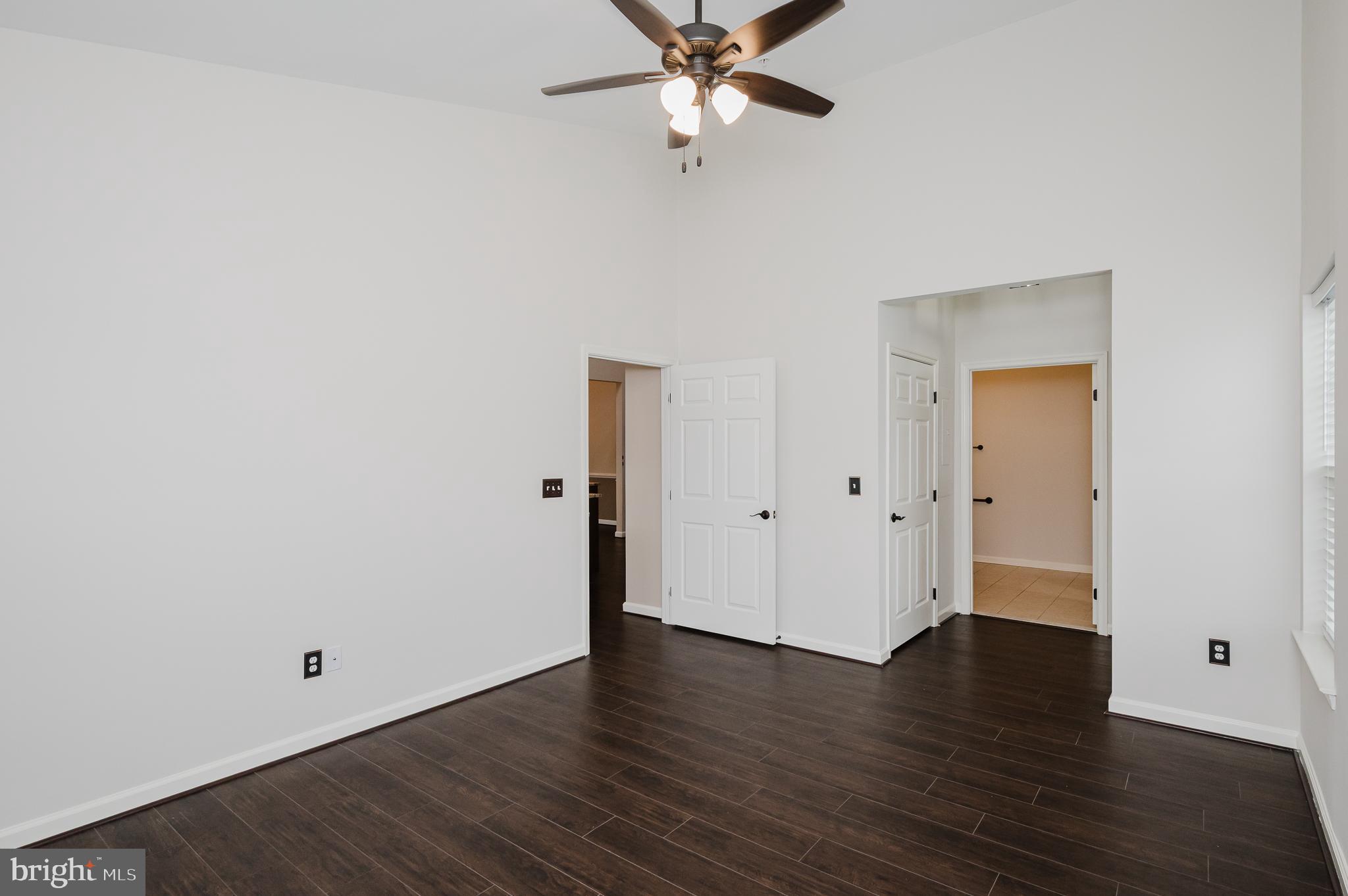 633 Wallingford Road, Unit 404 Bel Air, MD 21014 - Photo 24 of 52 a view of an empty room with wooden floor
