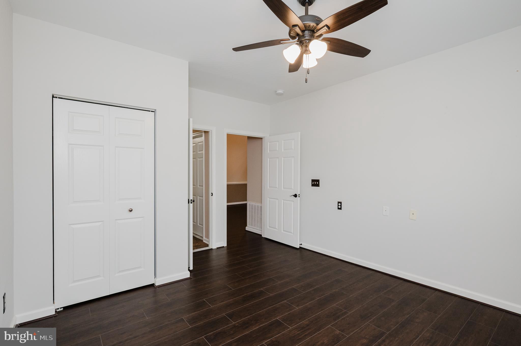 633 Wallingford Road, Unit 404 Bel Air, MD 21014 - Photo 30 of 52 a view of an empty room with wooden floor