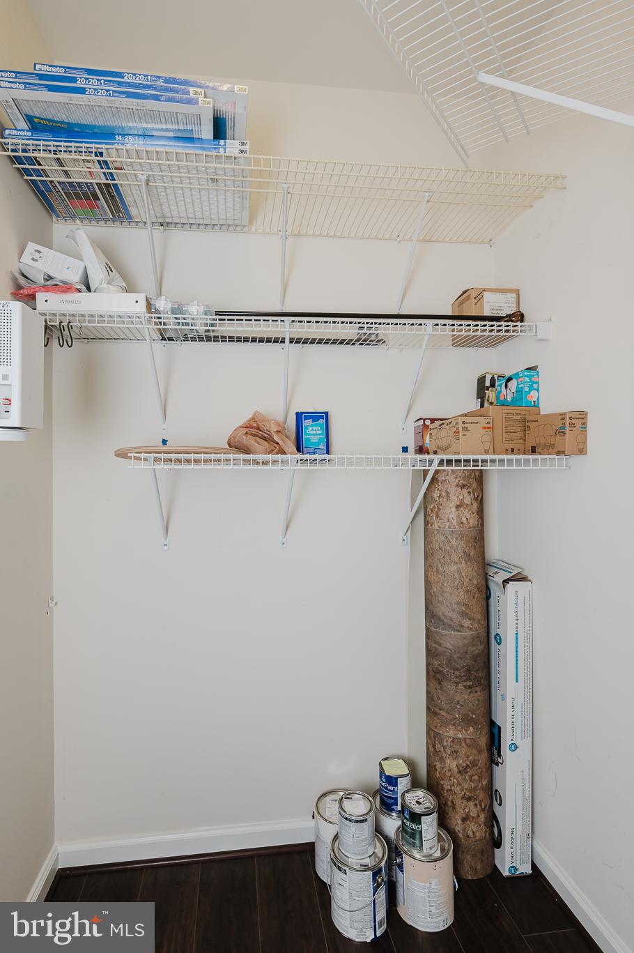 633 Wallingford Road, Unit 404 Bel Air, MD 21014 - Photo 34 of 52 a view of a shelf with water heater and racks on the wall