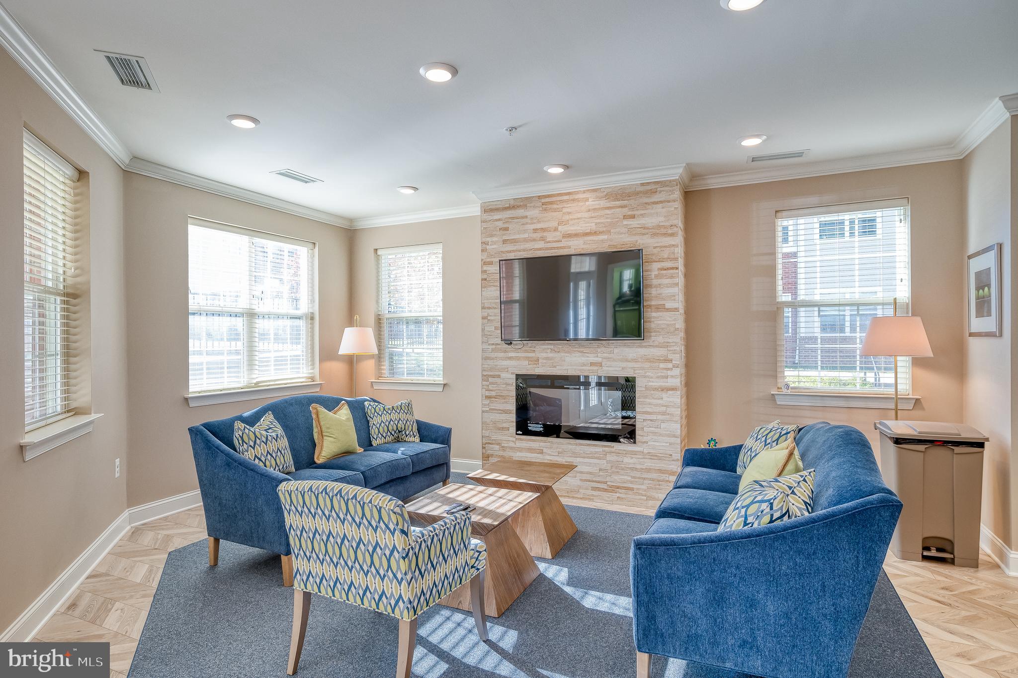 633 Wallingford Road, Unit 404 Bel Air, MD 21014 - Photo 47 of 52 a living room with fireplace furniture and a large window