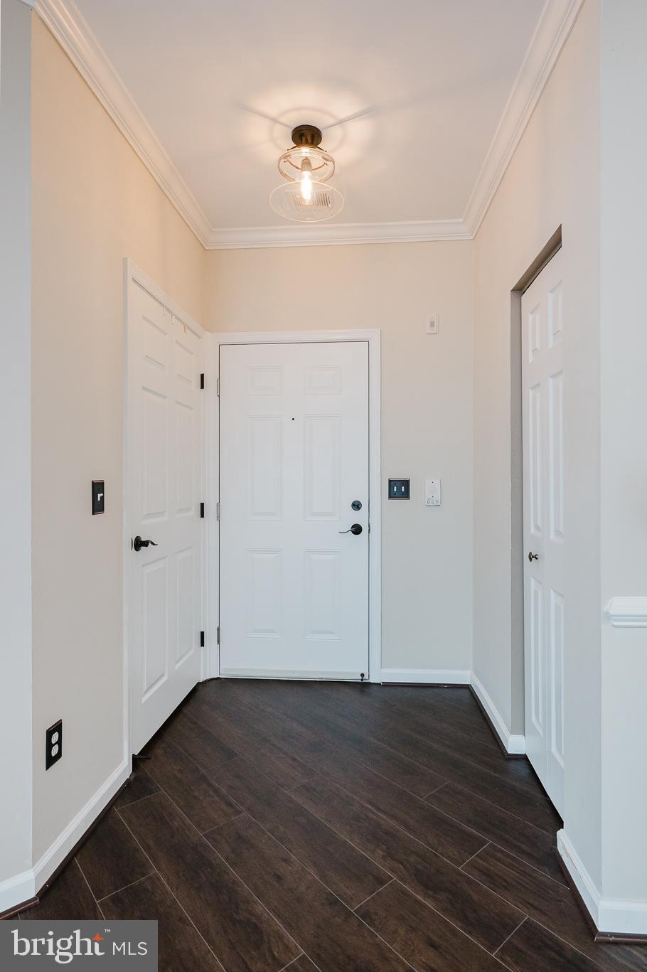 633 Wallingford Road, Unit 404 Bel Air, MD 21014 - Photo 8 of 52 a view of an empty room with wooden floor