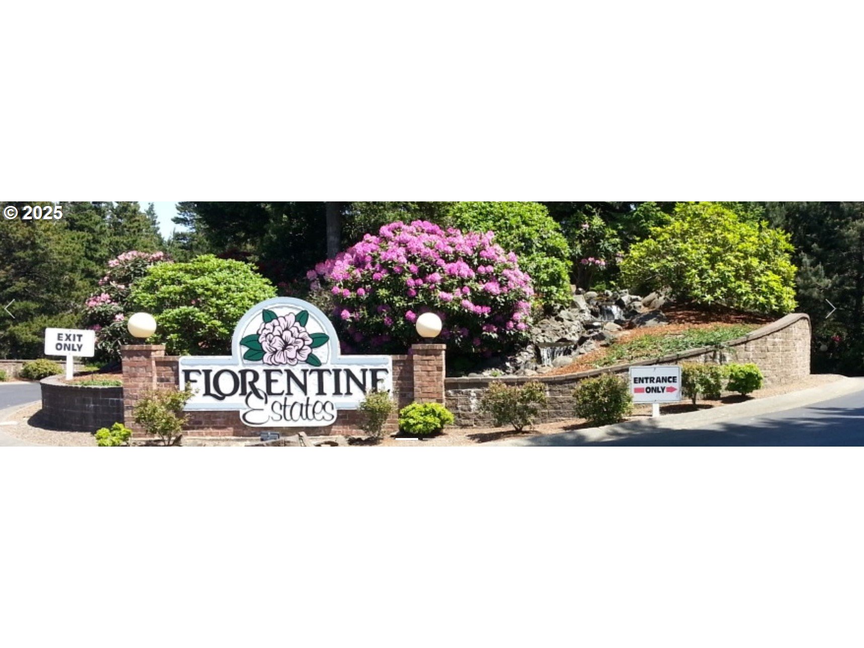 402 Sherwood Loop Florence, OR 97439 - Photo 32 of 33 a view of a wooden door with a bench