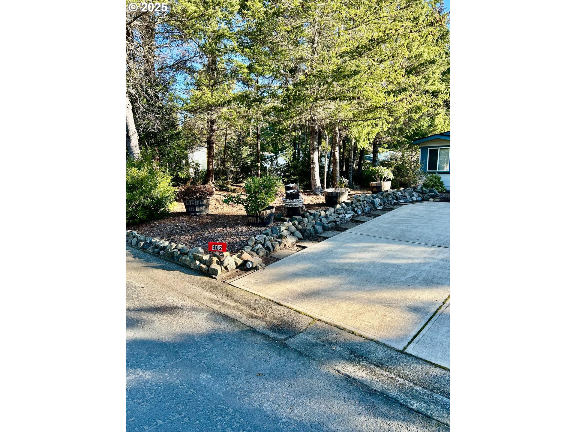 402 Sherwood Loop Florence, OR 97439 - Photo 4 of 33 a view of a backyard with sitting area