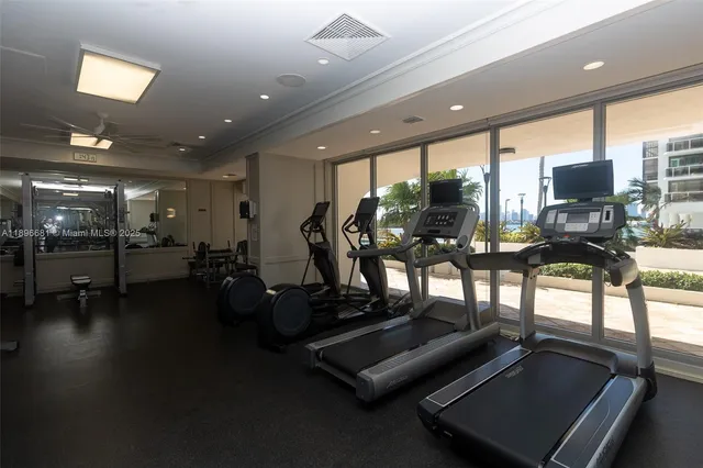 a view of a building with a yard