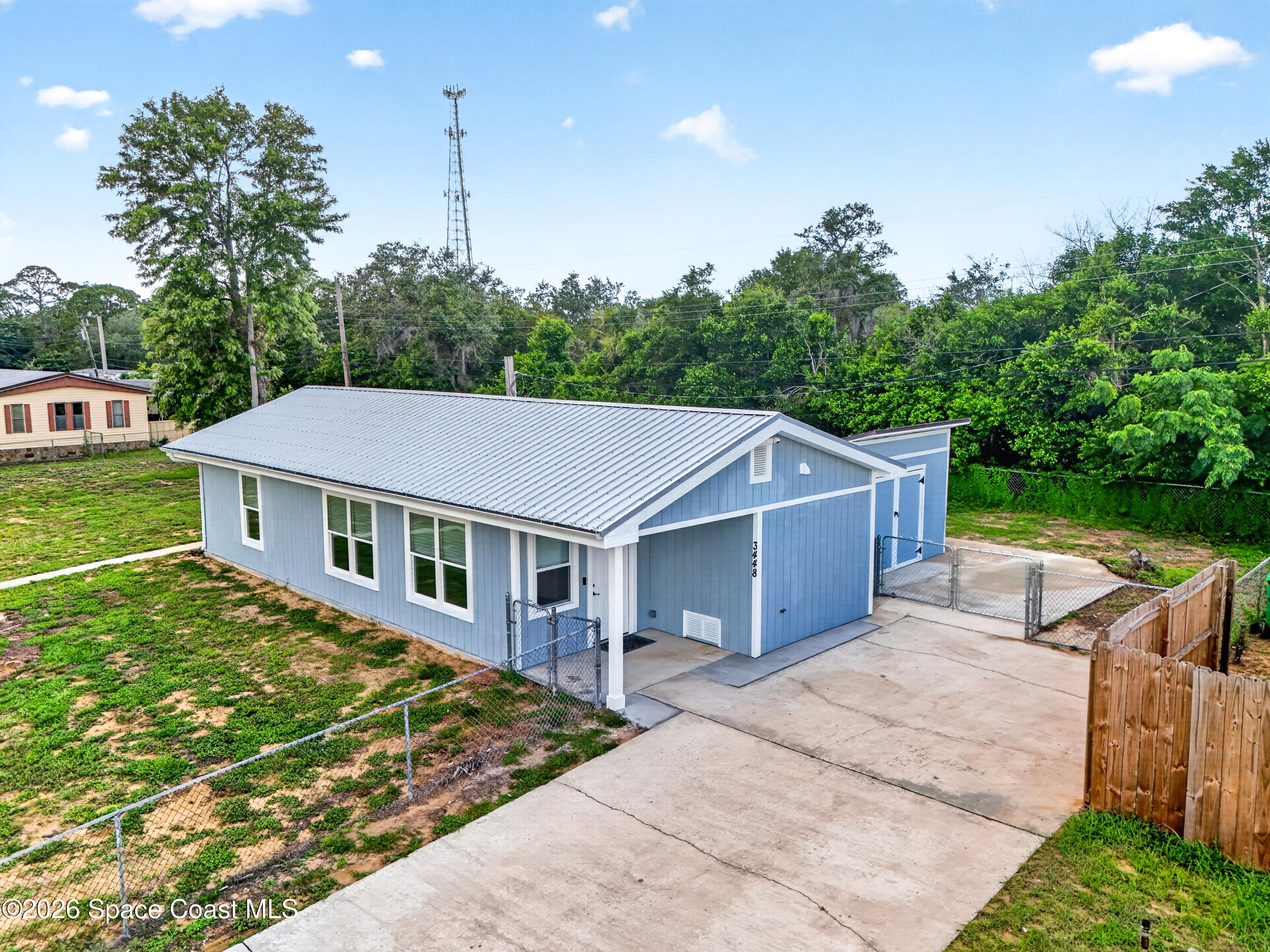 3448 Populatic Street Mims, FL 32754 - Photo 2 of 34 02-3448 Populatic-2