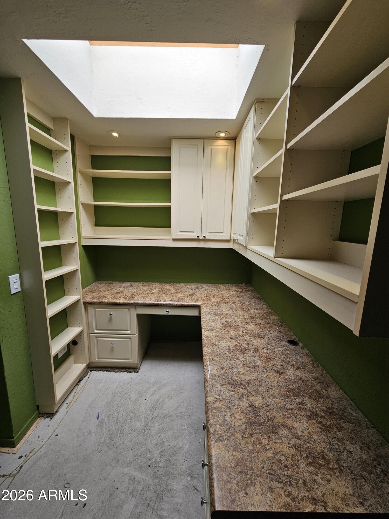 7003 North Barbados Place Phoenix, AZ 85021 - Photo 14 of 15 a kitchen with a cabinets and a stove