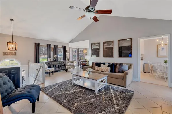a living room with furniture or couch and a fireplace