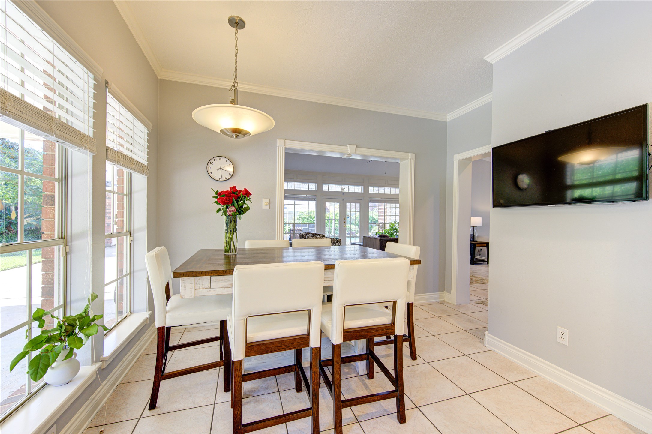 3622 Springhill Lane Sugar Land, TX 77479 - Photo 15 of 50 a view of a dining room with furniture window and wooden floor