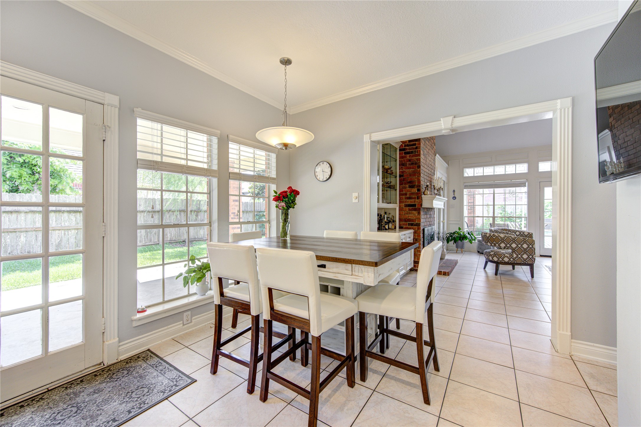 3622 Springhill Lane Sugar Land, TX 77479 - Photo 16 of 50 a view of a dining room and livingroom with furniture wooden floor a chandelier