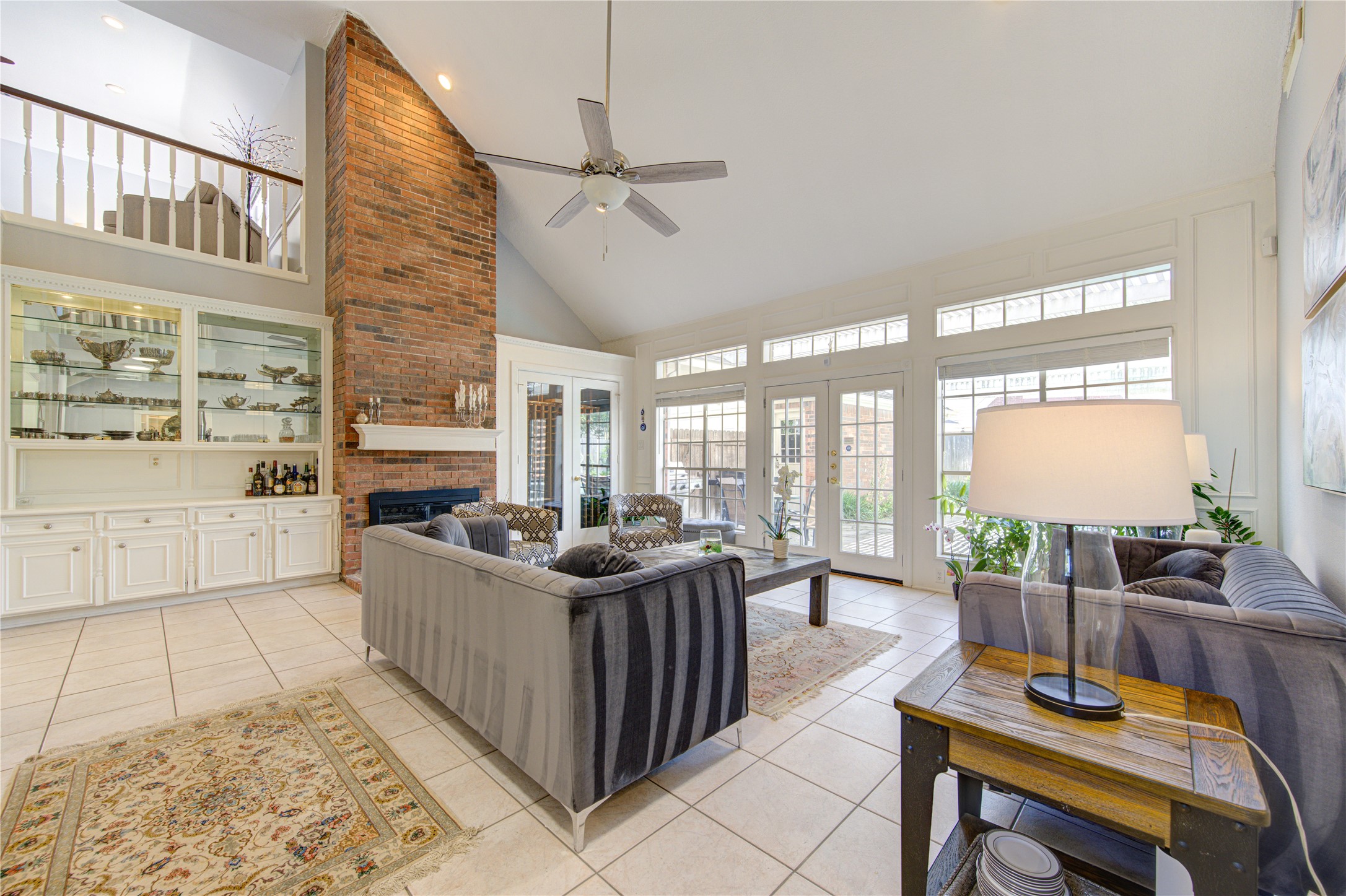 3622 Springhill Lane Sugar Land, TX 77479 - Photo 19 of 50 a living room with furniture a large window and kitchen view