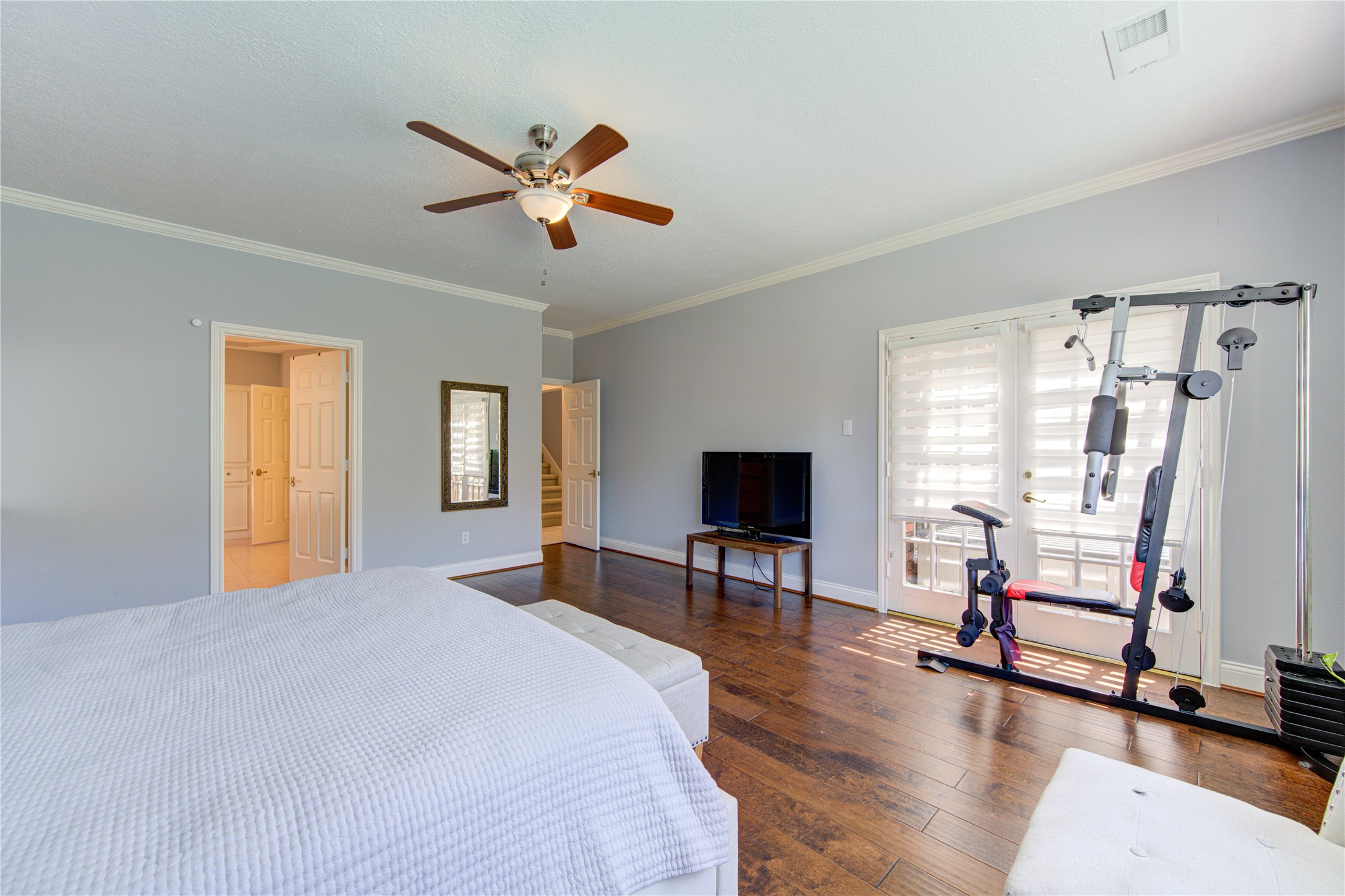 3622 Springhill Lane Sugar Land, TX 77479 - Photo 25 of 50 a bedroom with furniture window and a flat screen tv