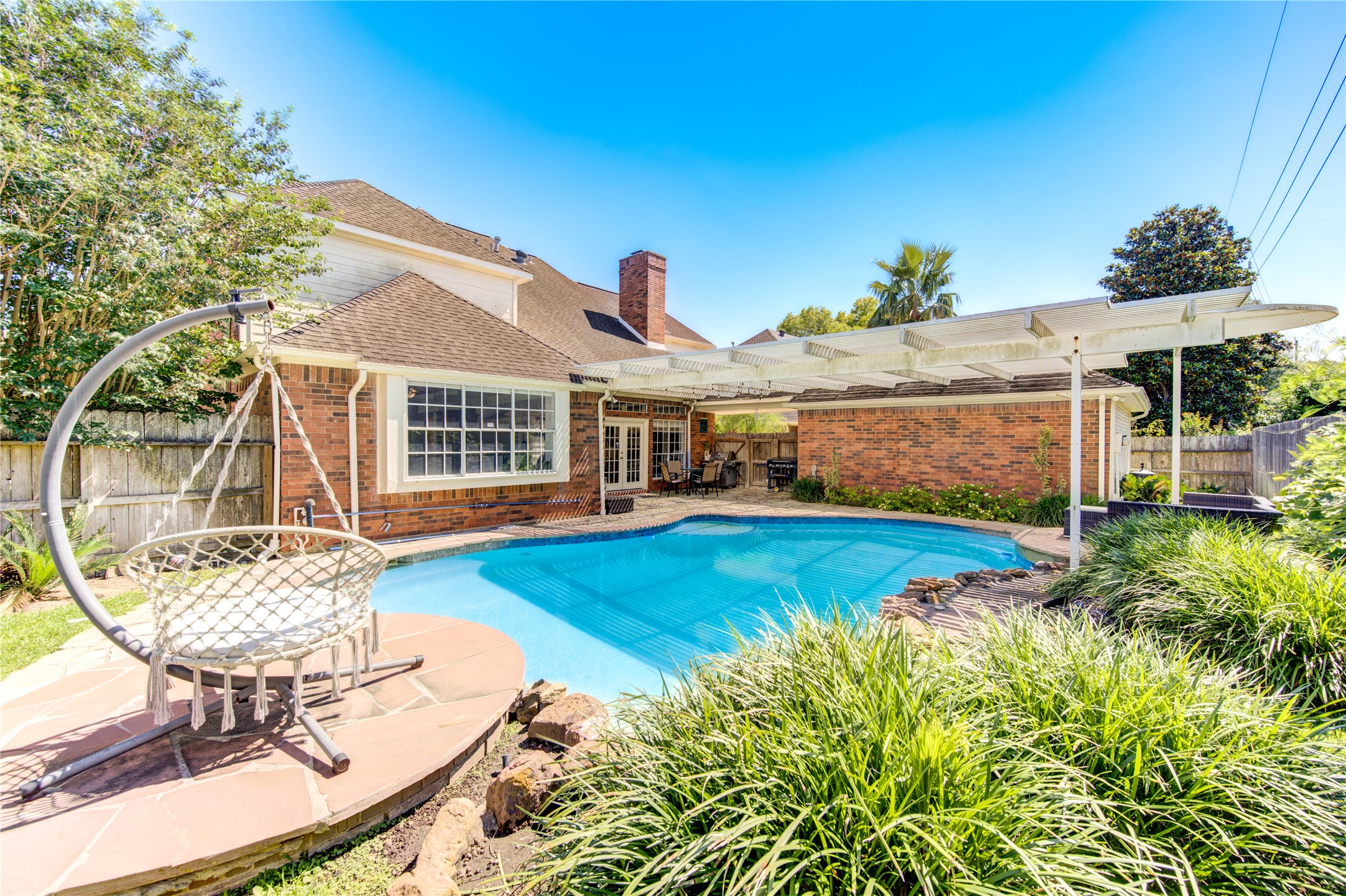 3622 Springhill Lane Sugar Land, TX 77479 - Photo 45 of 50 a front view of a house with garden